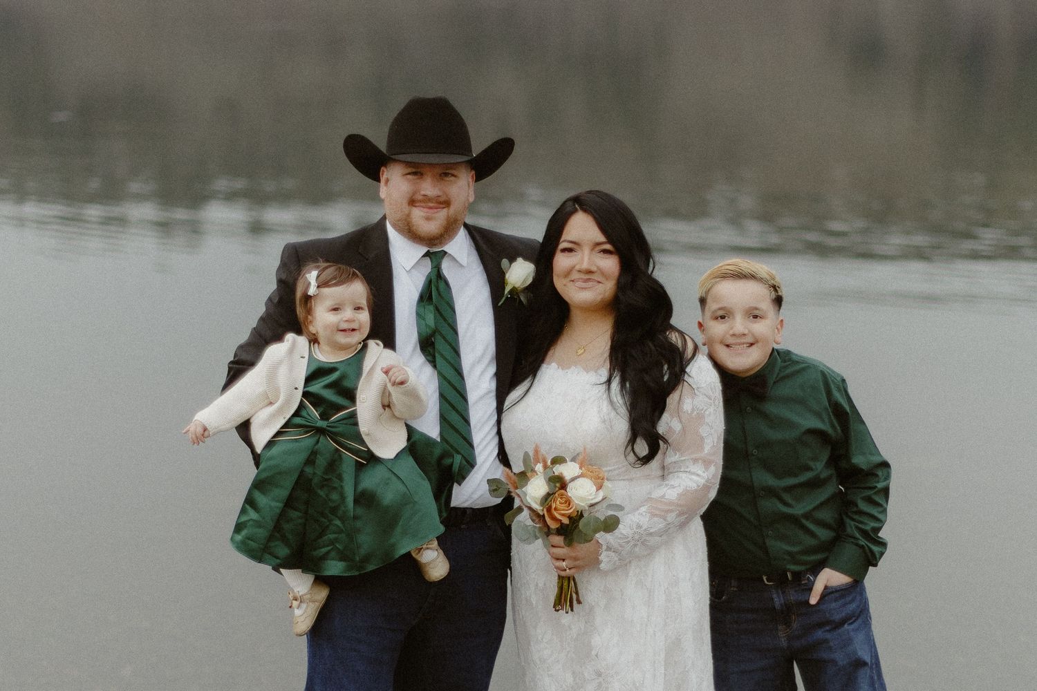 Wedding party portrait with bride, groom, and children near the Columbia River, Pacific Northwest wedding photographer