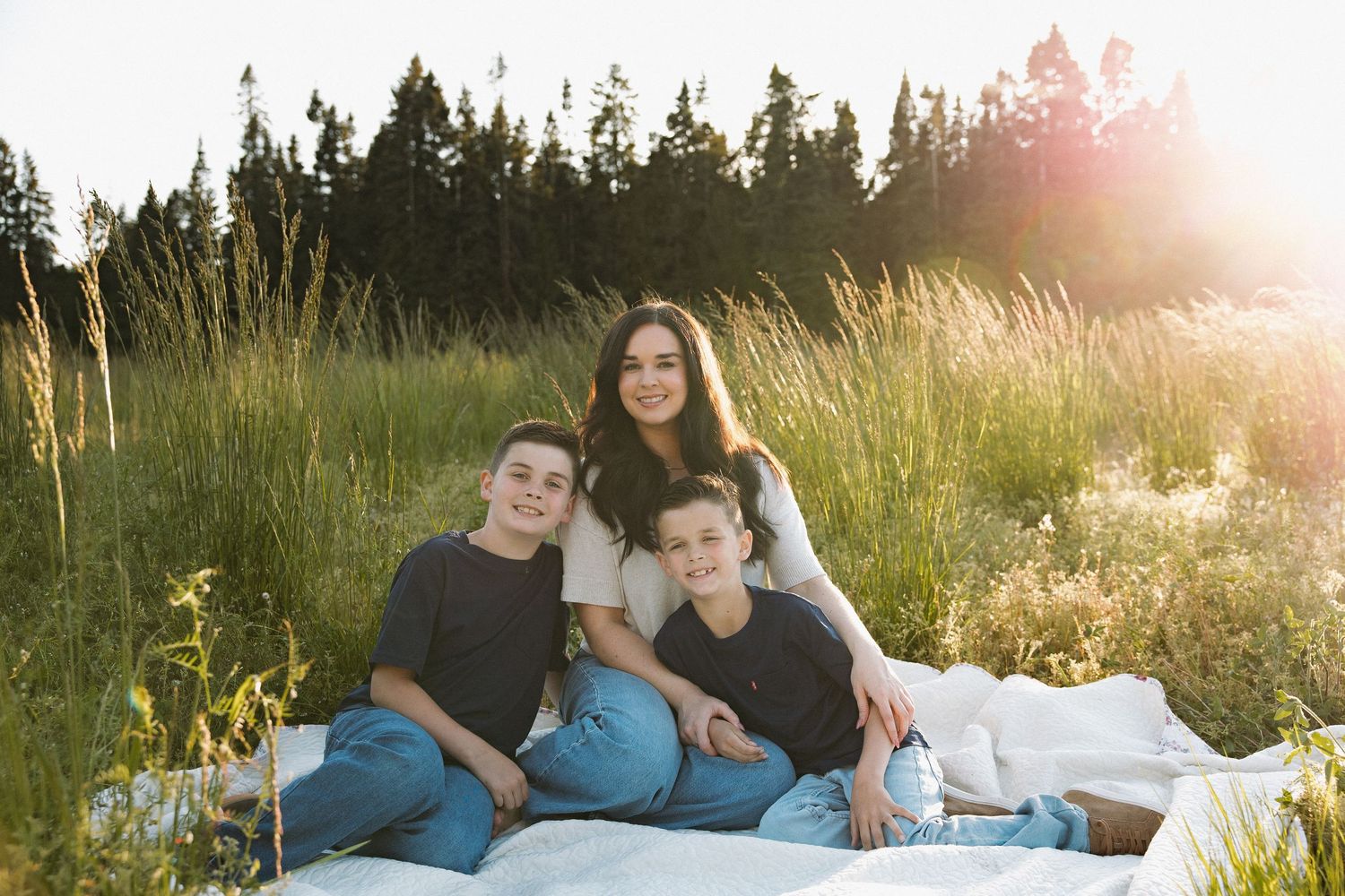 Family session at golden hour in a wildflower field near Vancouver WA, photographer By Ricki Elaine