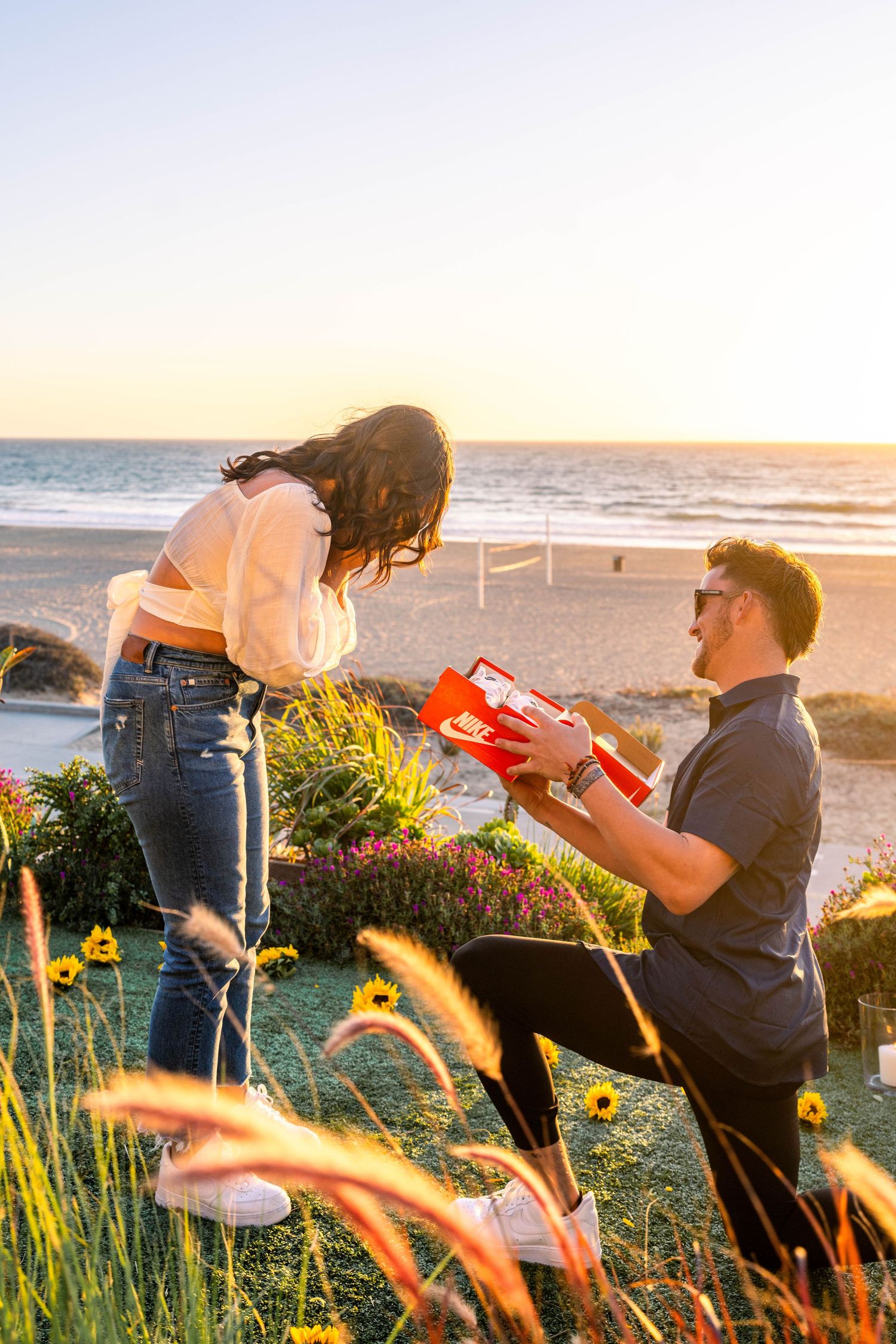 Surprise Proposal Photography at Manhattan Beach in Los Angeles California by Photographer Tim Guerrero from Pasadena