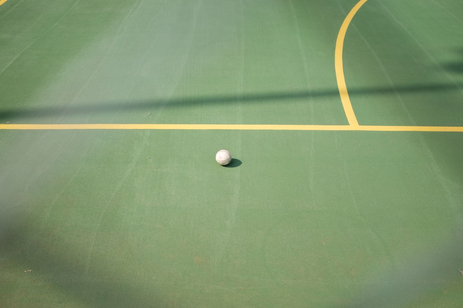 Cricket ball in Netball courts