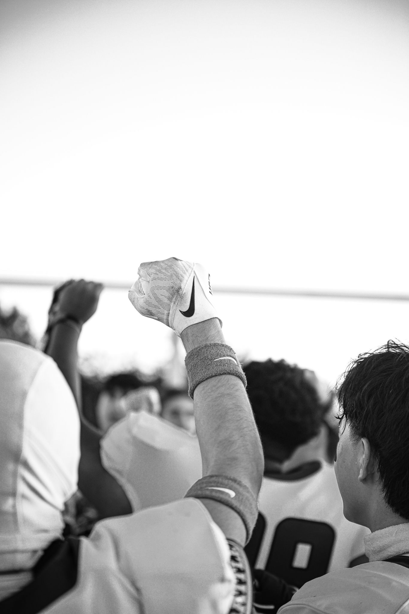 R.L. Paschal High School football player supports the team with his fist up at halftime before their game starts against O.D. Wyatt High.