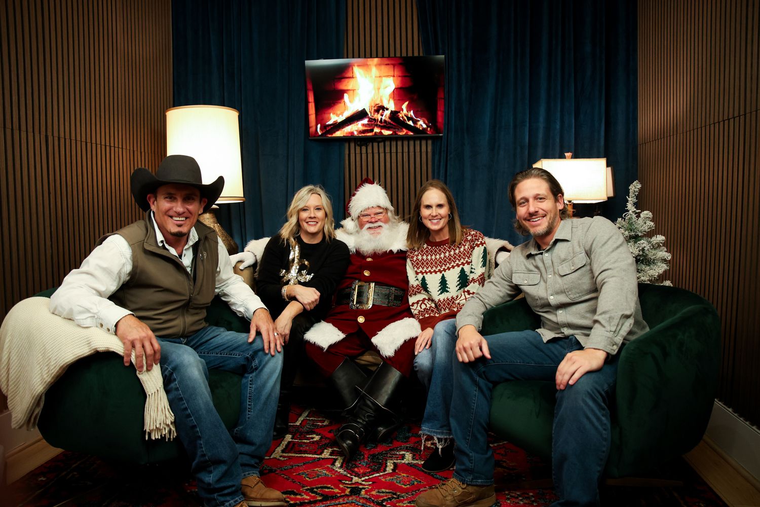Sixth Avenue Real Estate's staff members pose with Santa at their annual Christmas Party to celebrate the company in Fort Worth, Texas.