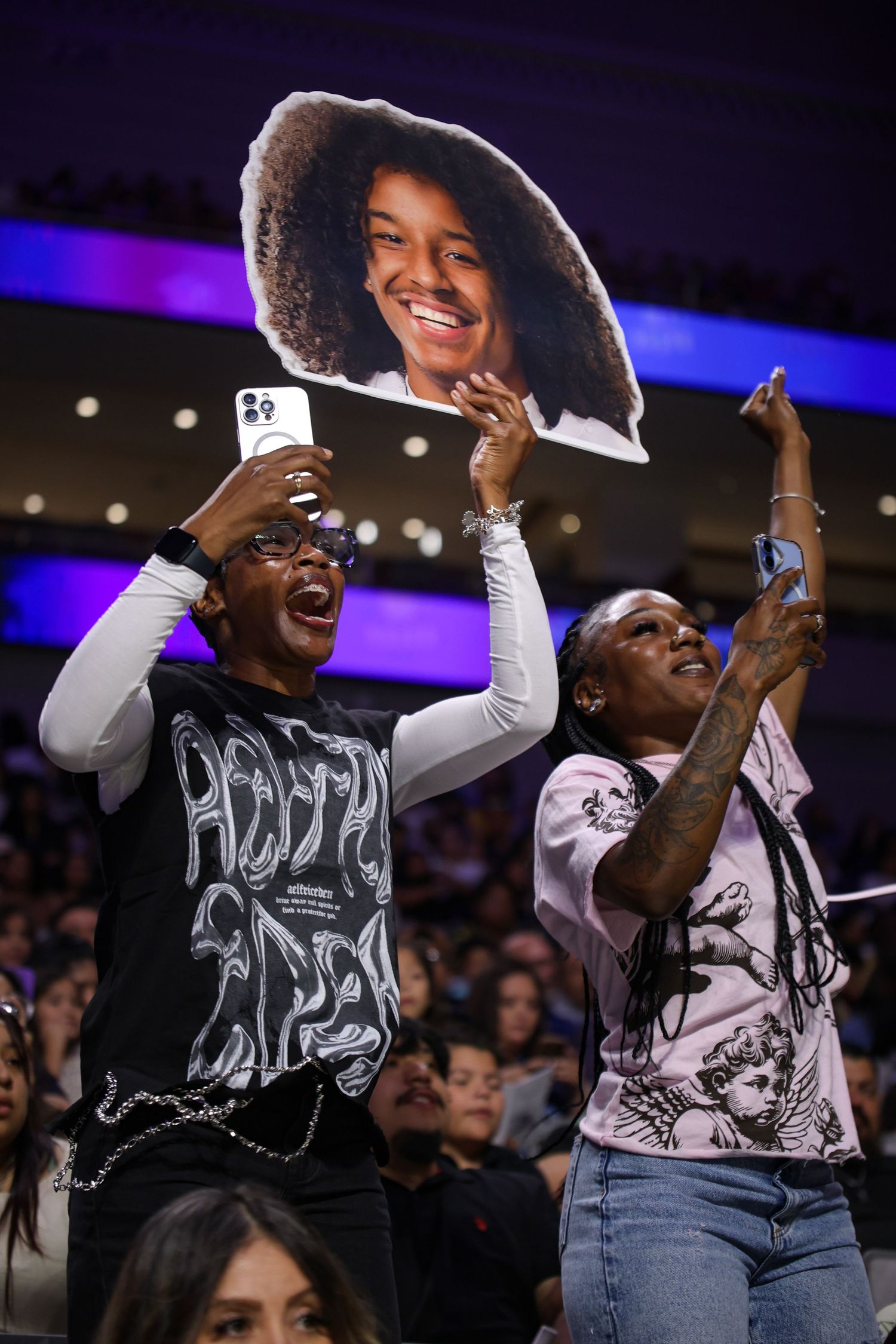 R.L. Paschal High School family yells as their kid graduates as a part of the Class of 2026 in Dickies Arena in Fort Worth, Texas.