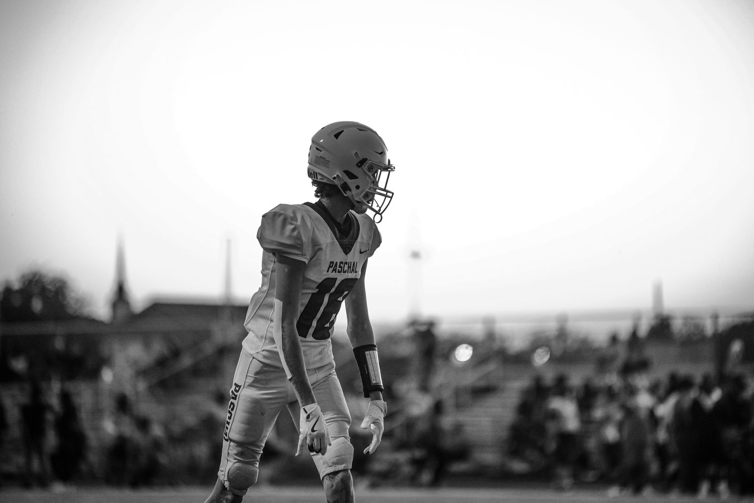 R.L. Paschal, a football player, waits for the quarterback to signal him to run at a game against O.D. Wyatt High School in Fort Worth.