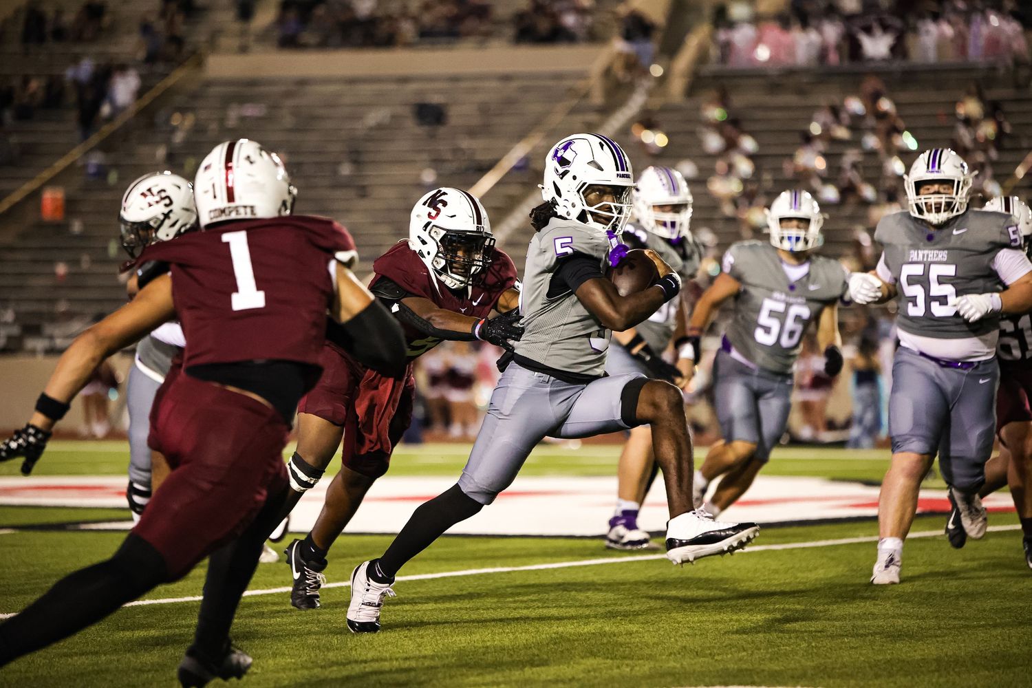R.L. Paschal High School quarterback destroying the defense of Northside High School at Farrington Field in Fort Worth, Texas.