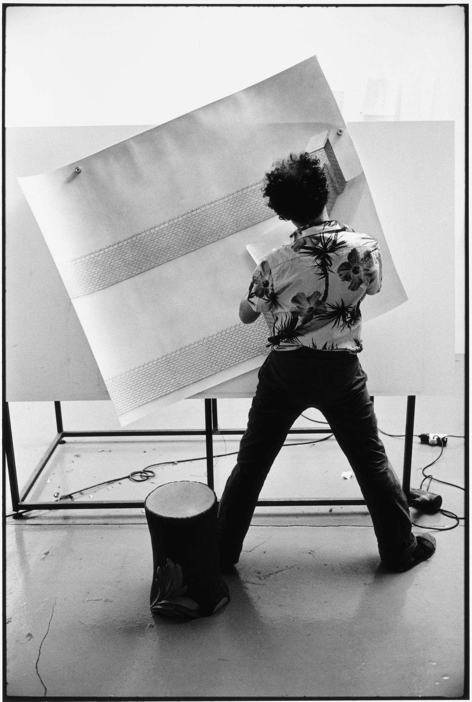 Black and white sequence showing Gagosian artist Paul Noble at work on large scale pencil on paper. London