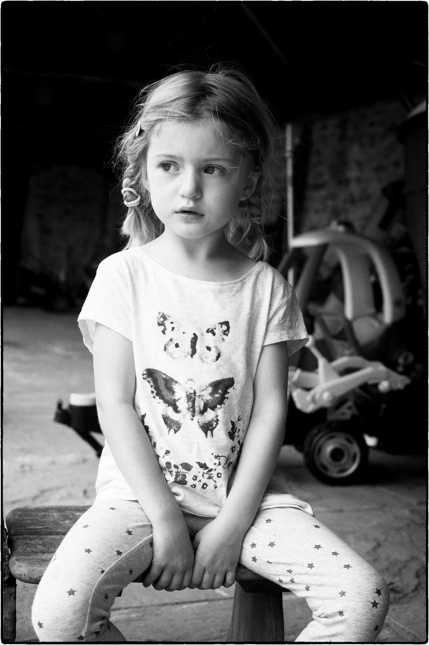 Artistic black and white portrait series in vintage style with dramatic lighting.