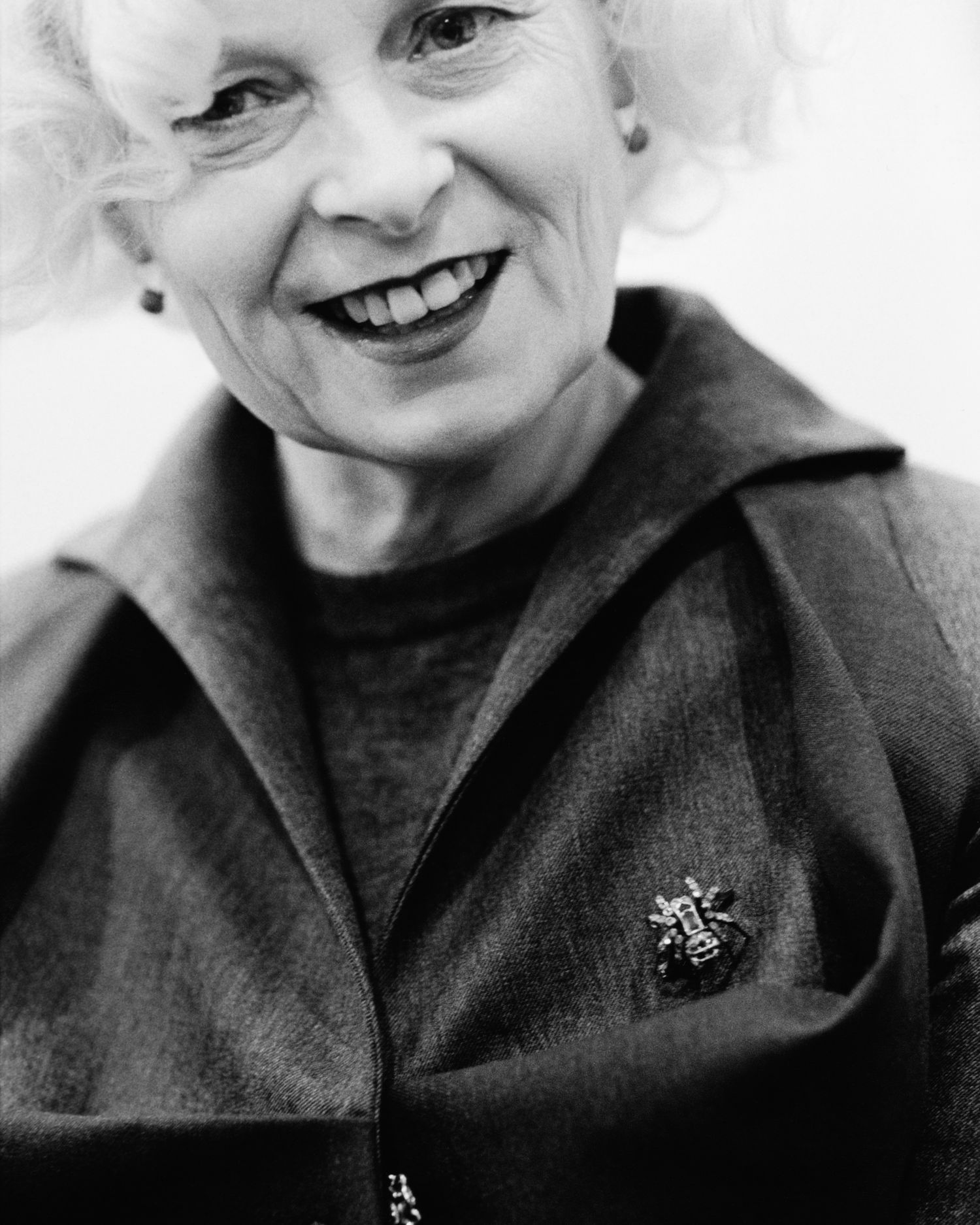 Series of black and white close-up portrait shots showing warm expressions.