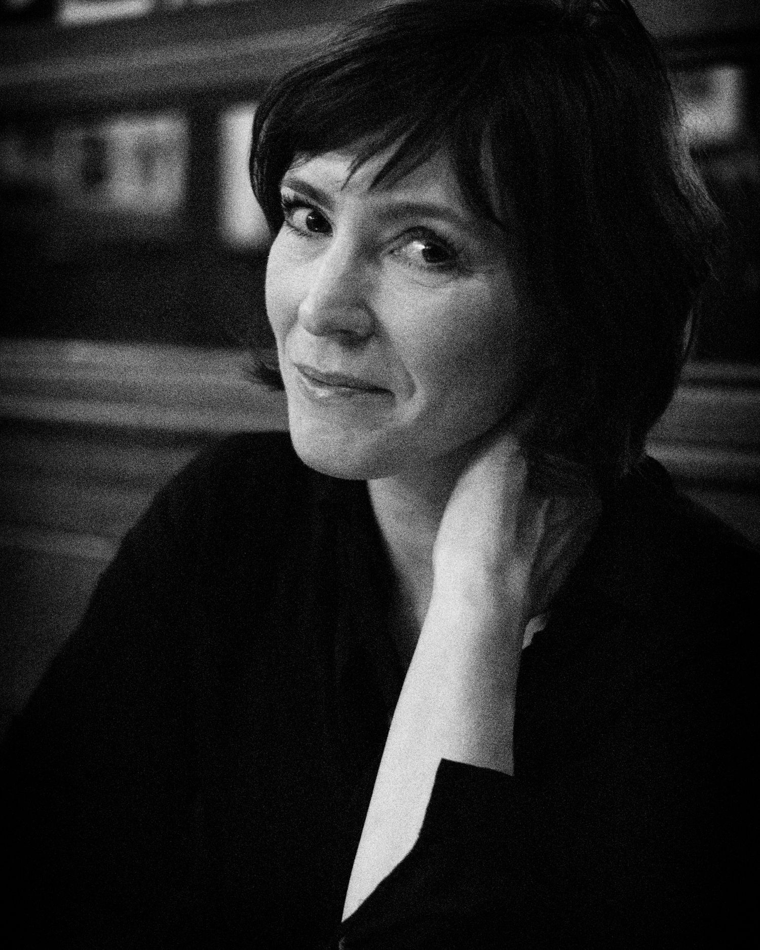 Artistic black and white portrait series showing contemplative side views.