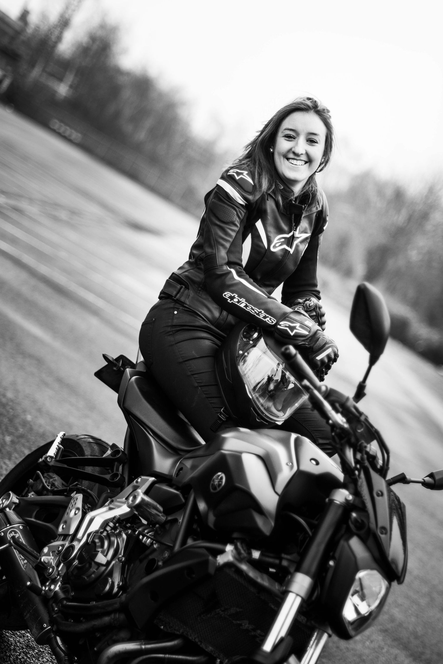 Black and white motorcycle photoshoot series showing dynamic riding poses.