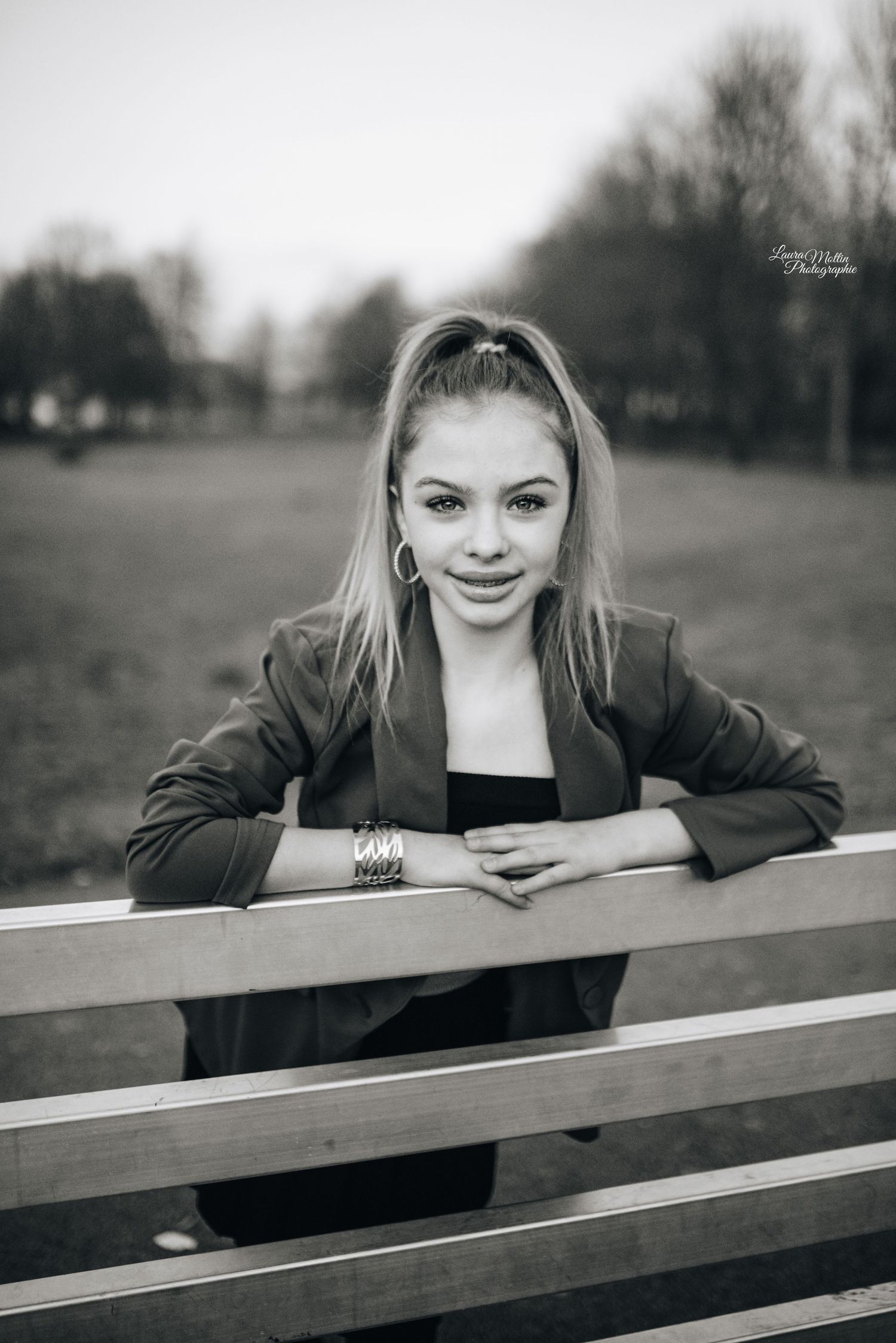 Black and white portrait series showing someone leaning on a wooden railing outdoors.