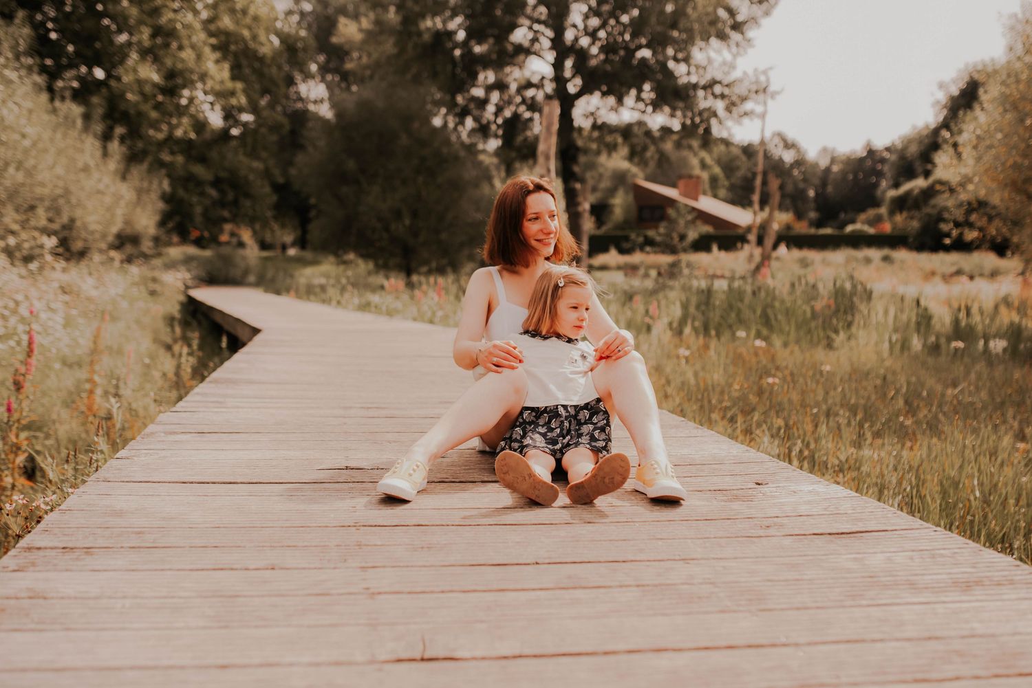 A series of candid outdoor lifestyle photos on a wooden deck in warm sunlight.