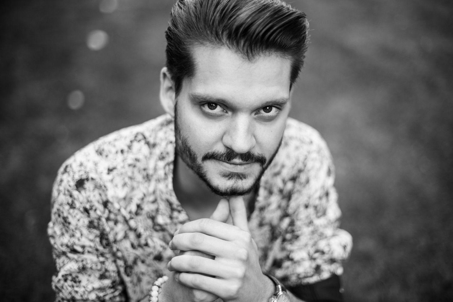 Close-up black and white portraits showing dramatic lighting and expressions.