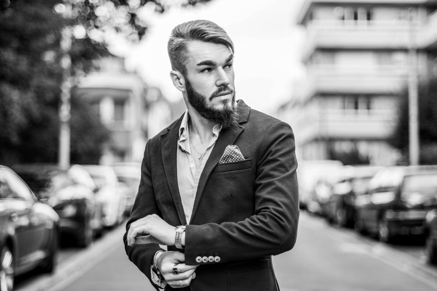 Black and white street photography with urban setting.
