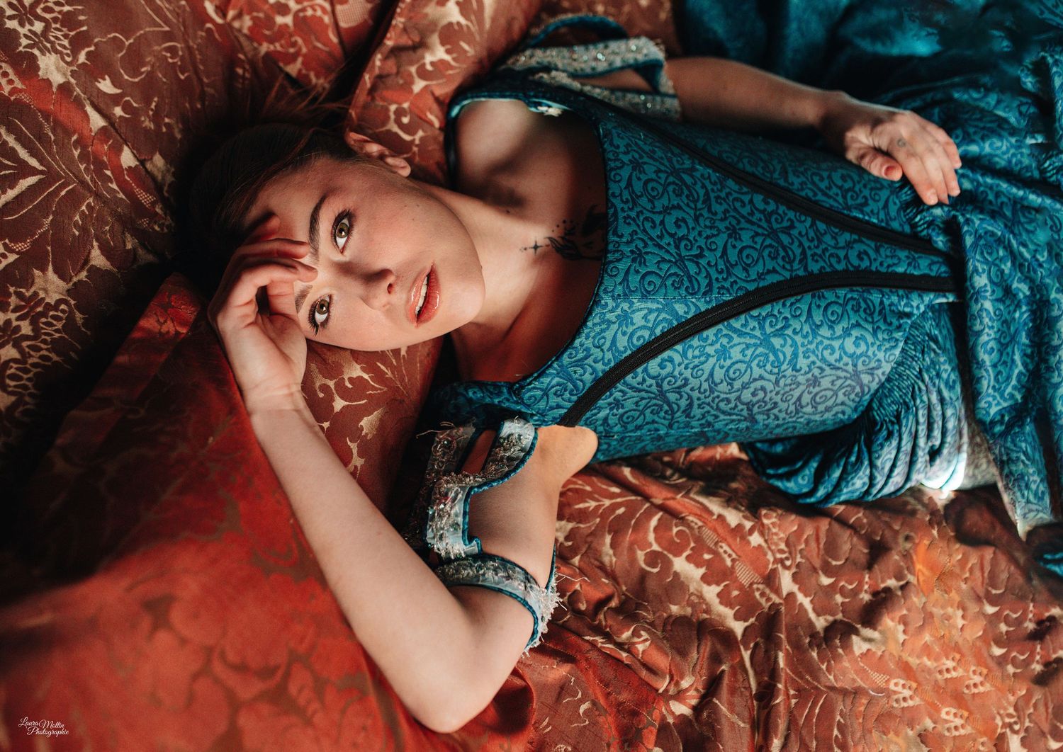 Artistic portrait series on teal backdrop with copper tones and dramatic lighting.