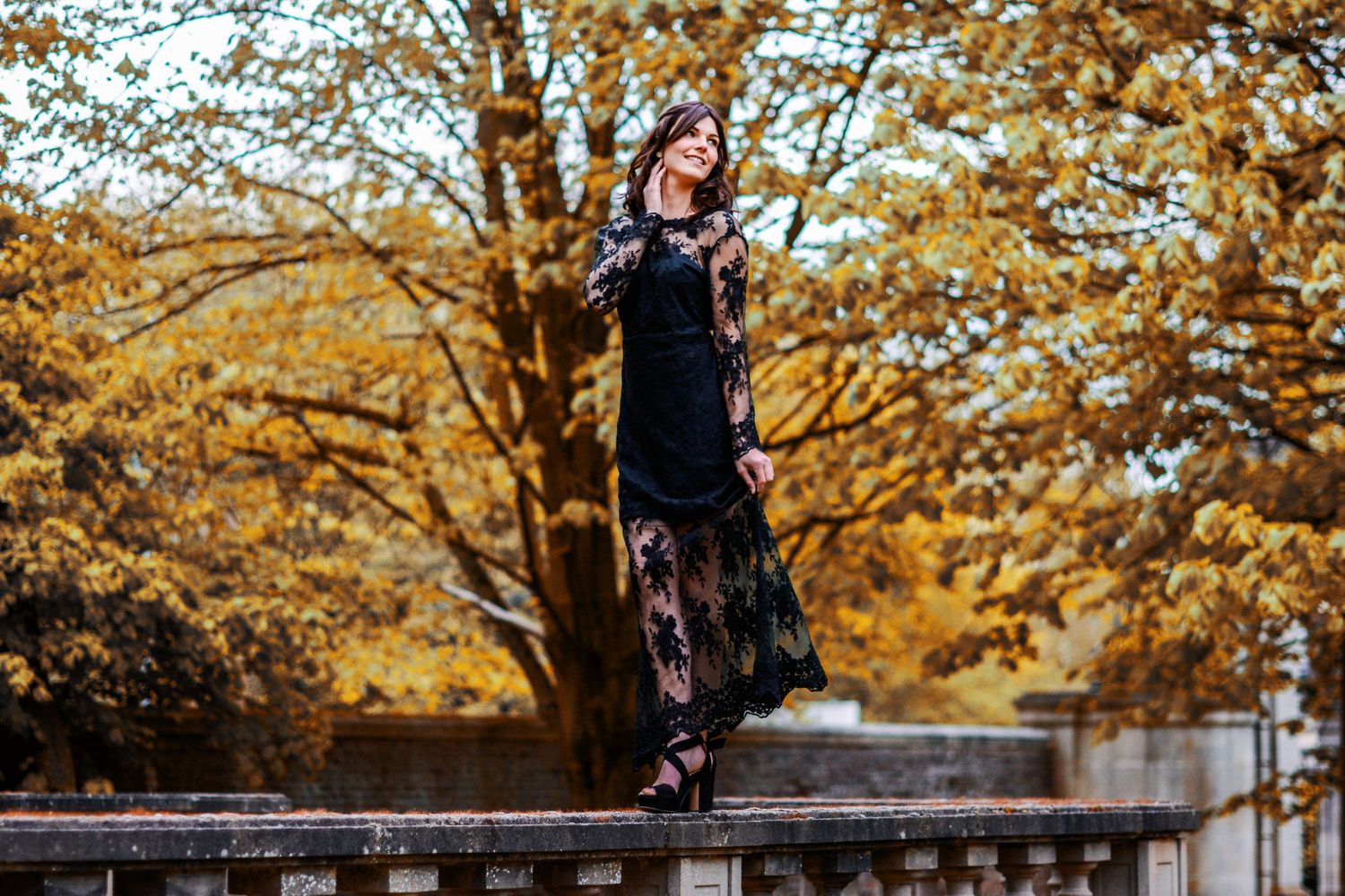 Dreamy autumn portrait series with warm golden tones and natural bokeh effect.