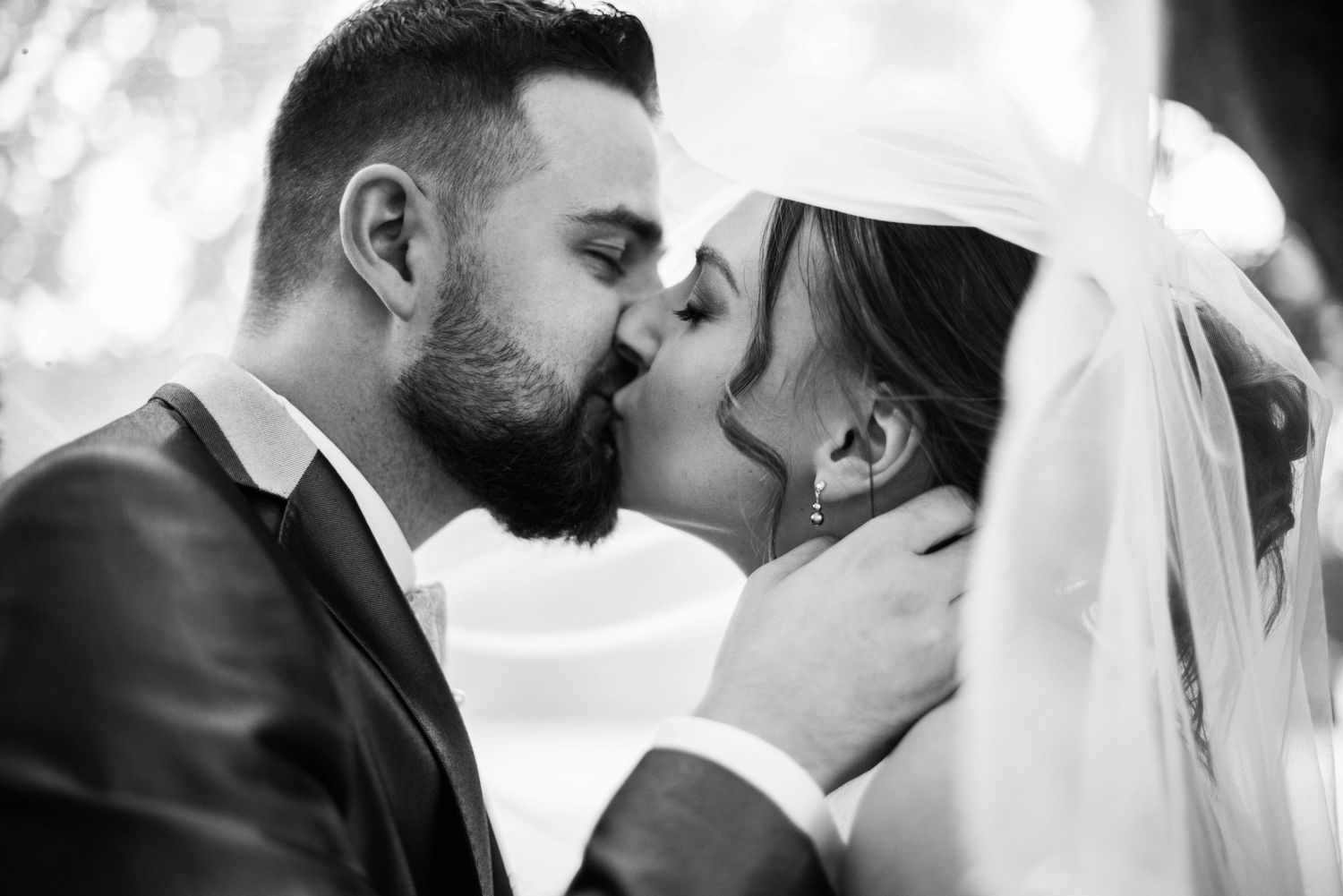 Intimate black and white wedding photography moments.