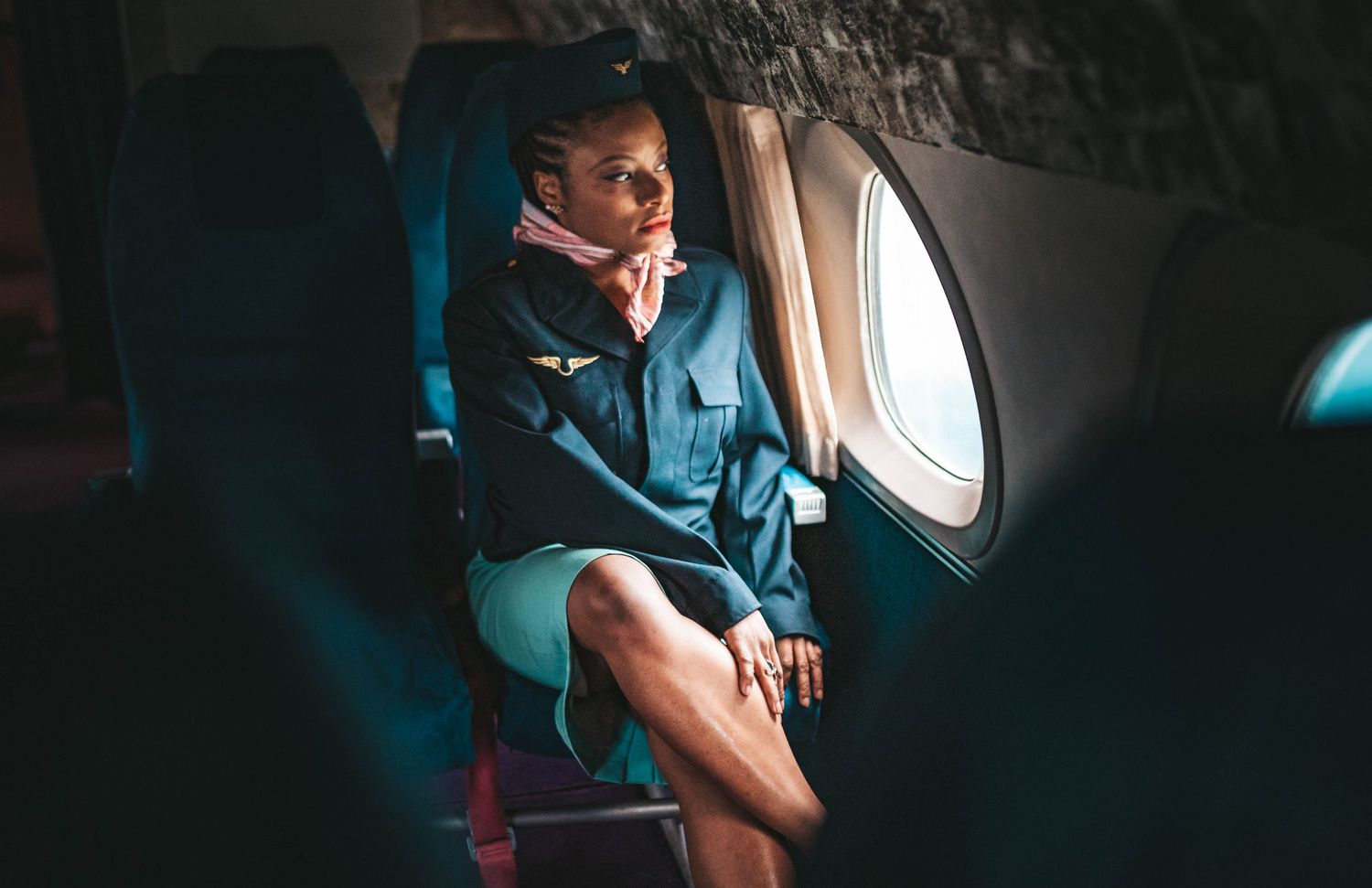 Dramatic low light portrait inside aircraft cockpit.