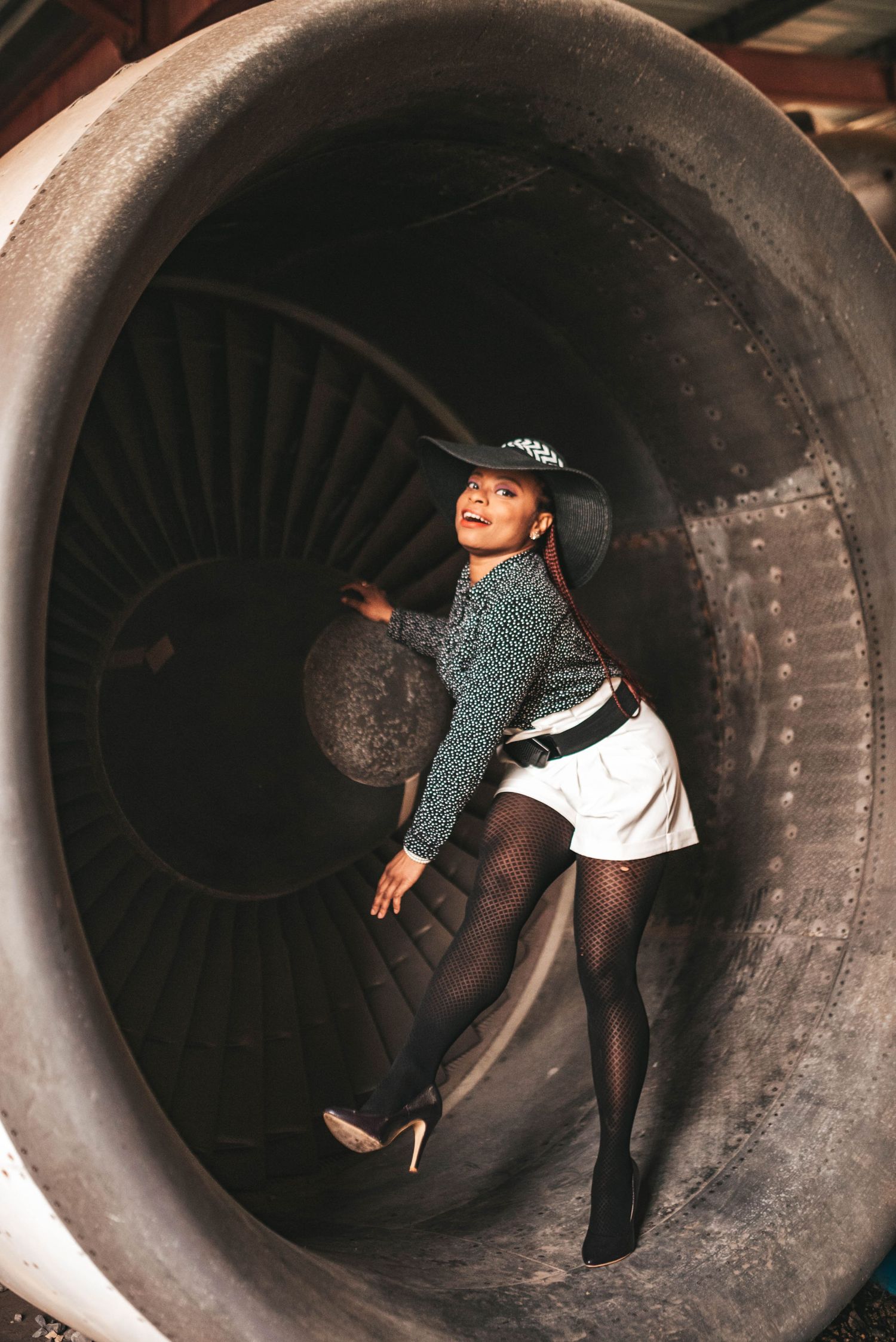 Creative black and white photos taken inside an aircraft engine turbine.