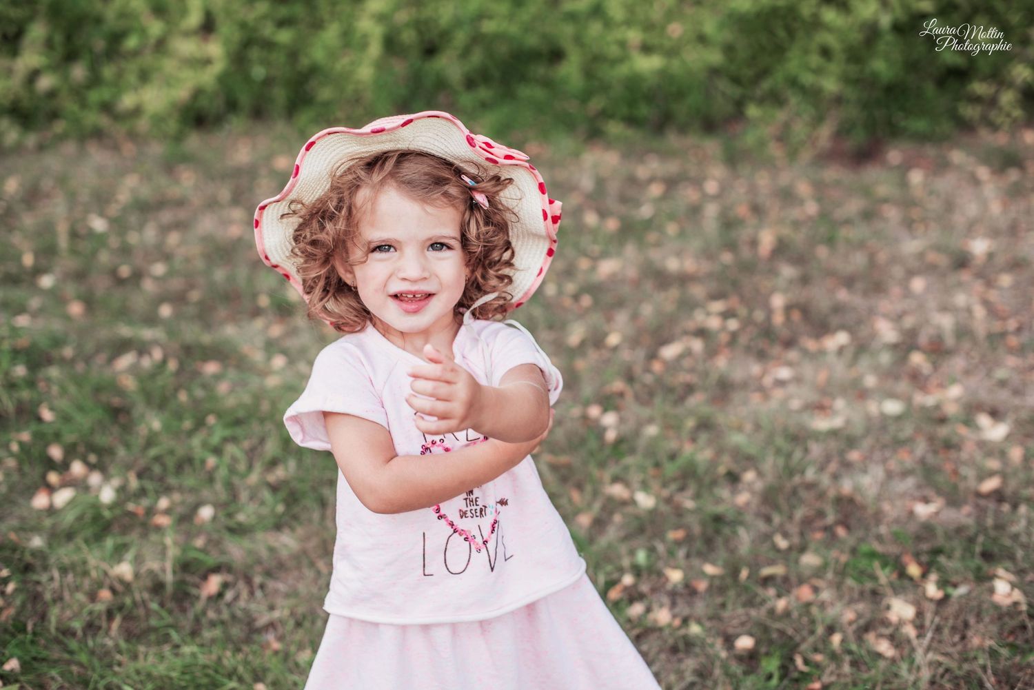 Series of photos showing a small child in pink dress outdoors.