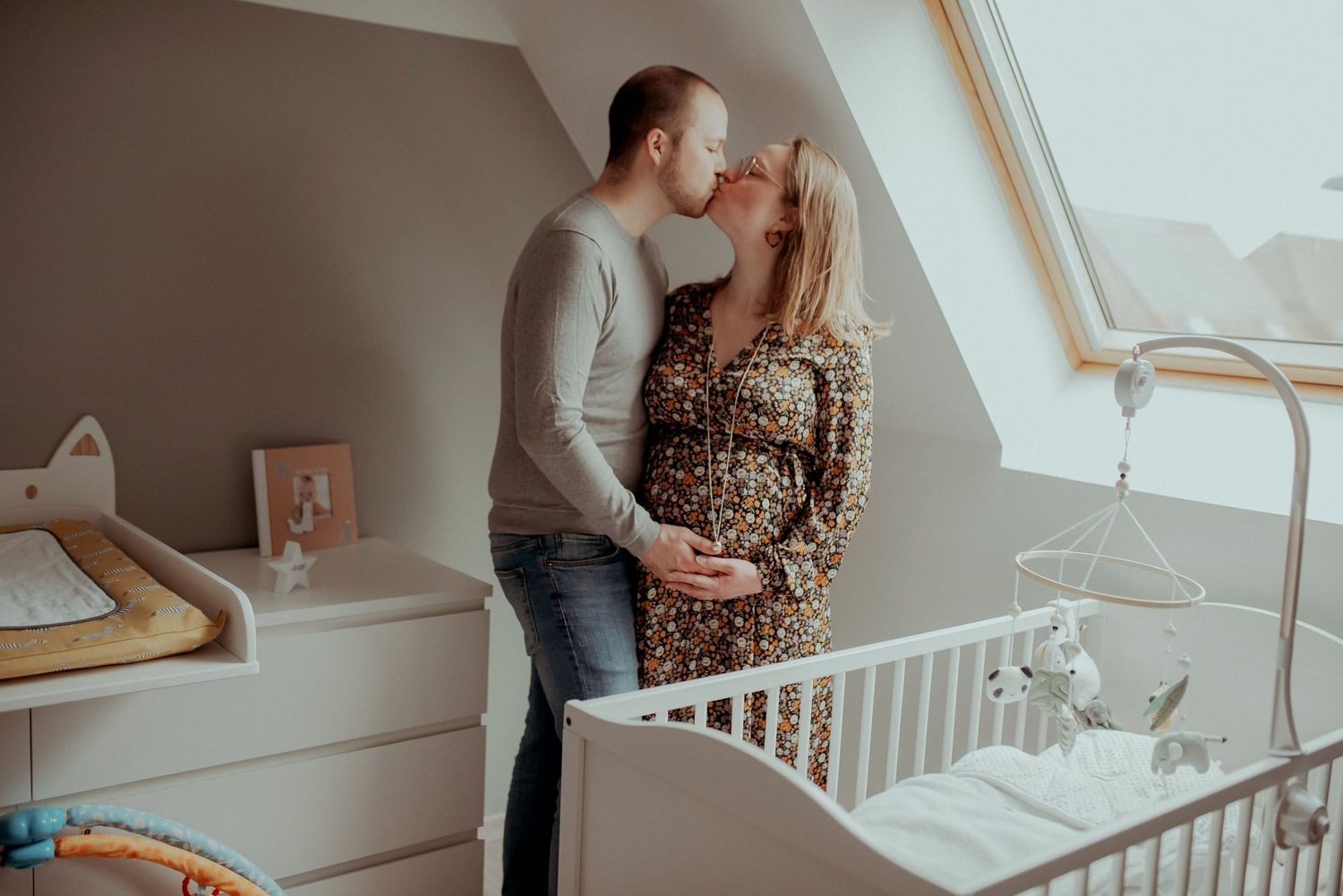 Interior home photos showing intimate moments in a bright, modern nursery room.