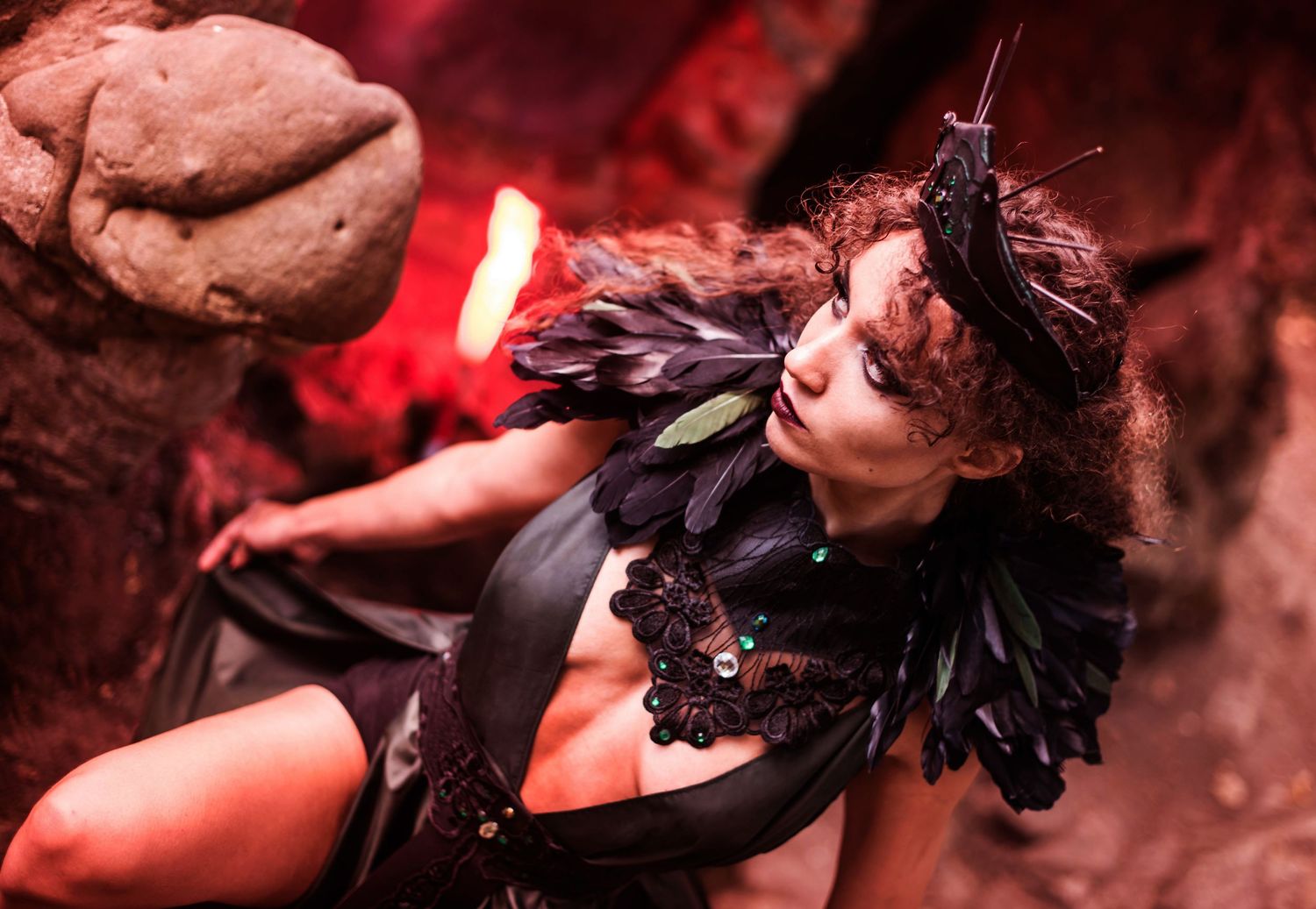 Dark and dramatic portraits with red lighting and gothic fantasy elements.