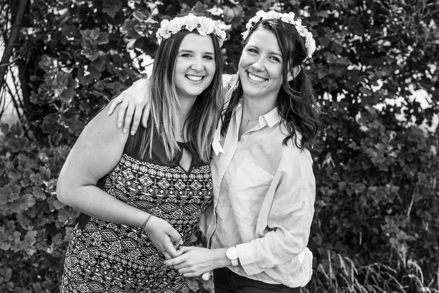 Black and white portraits showing joyful moments between friends.