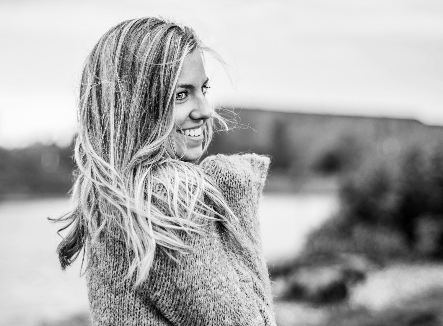 Black and white portrait series showing joyful expressions and natural moments.