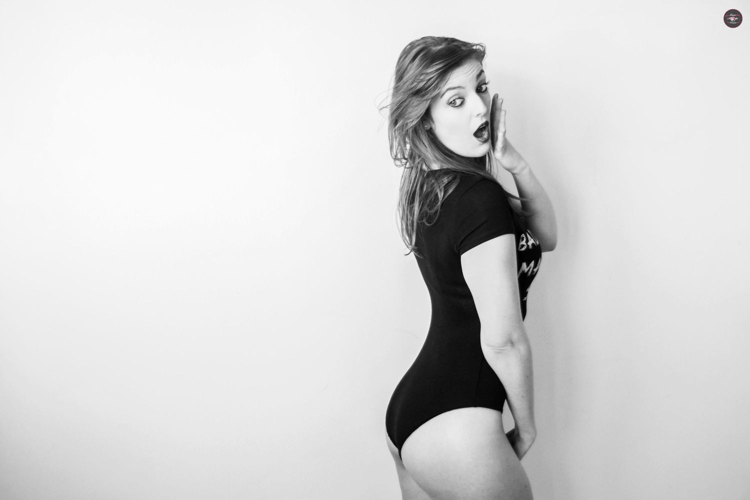 Black and white artistic portrait series with dramatic lighting and poses.
