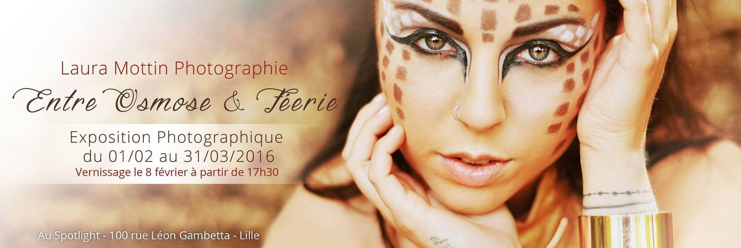 Close-up artistic portrait with decorative eye makeup and soft lighting effects.