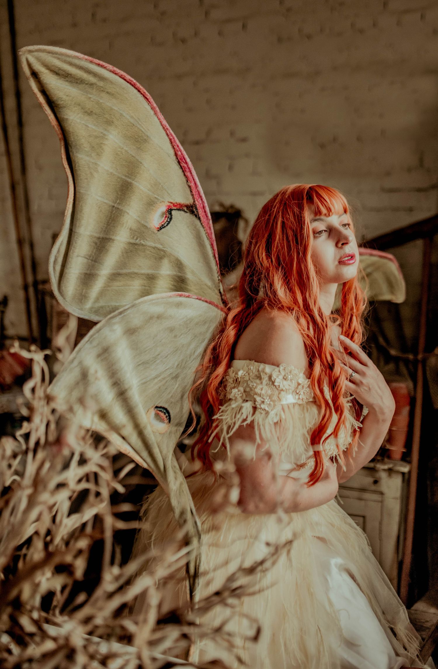 Dreamy fairy-themed portrait with gossamer wings and vintage aesthetic.