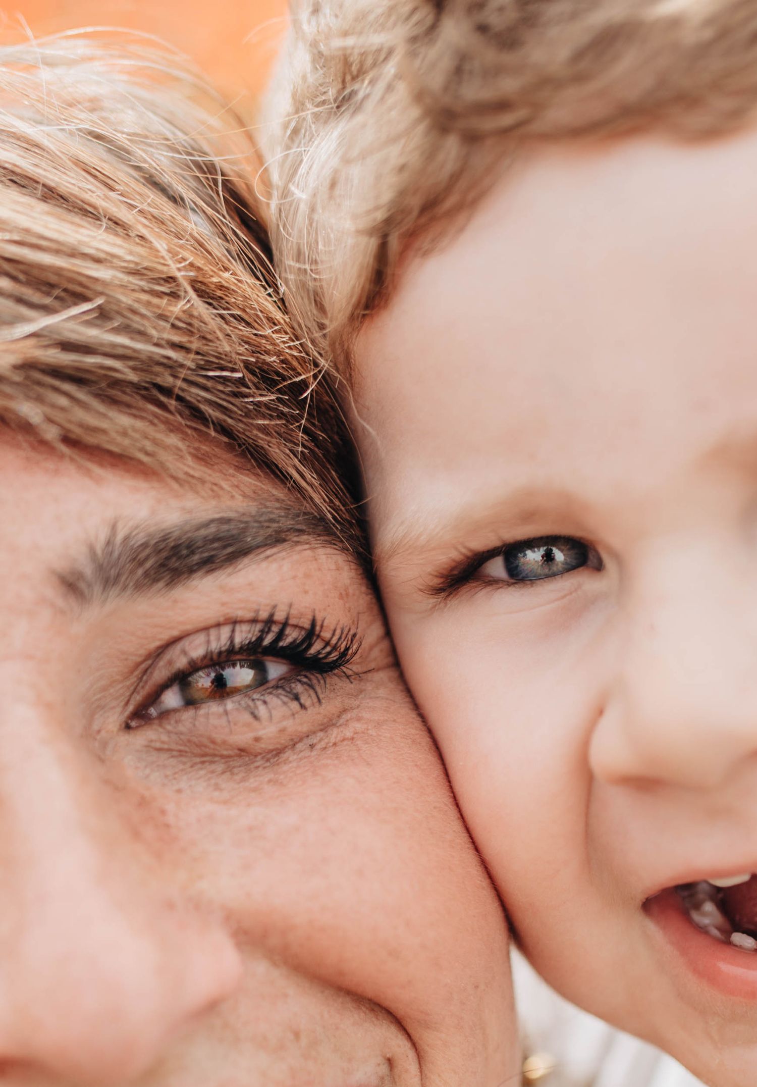 Extreme closeup portrait series showing eyes and expressions in warm peachy tones.