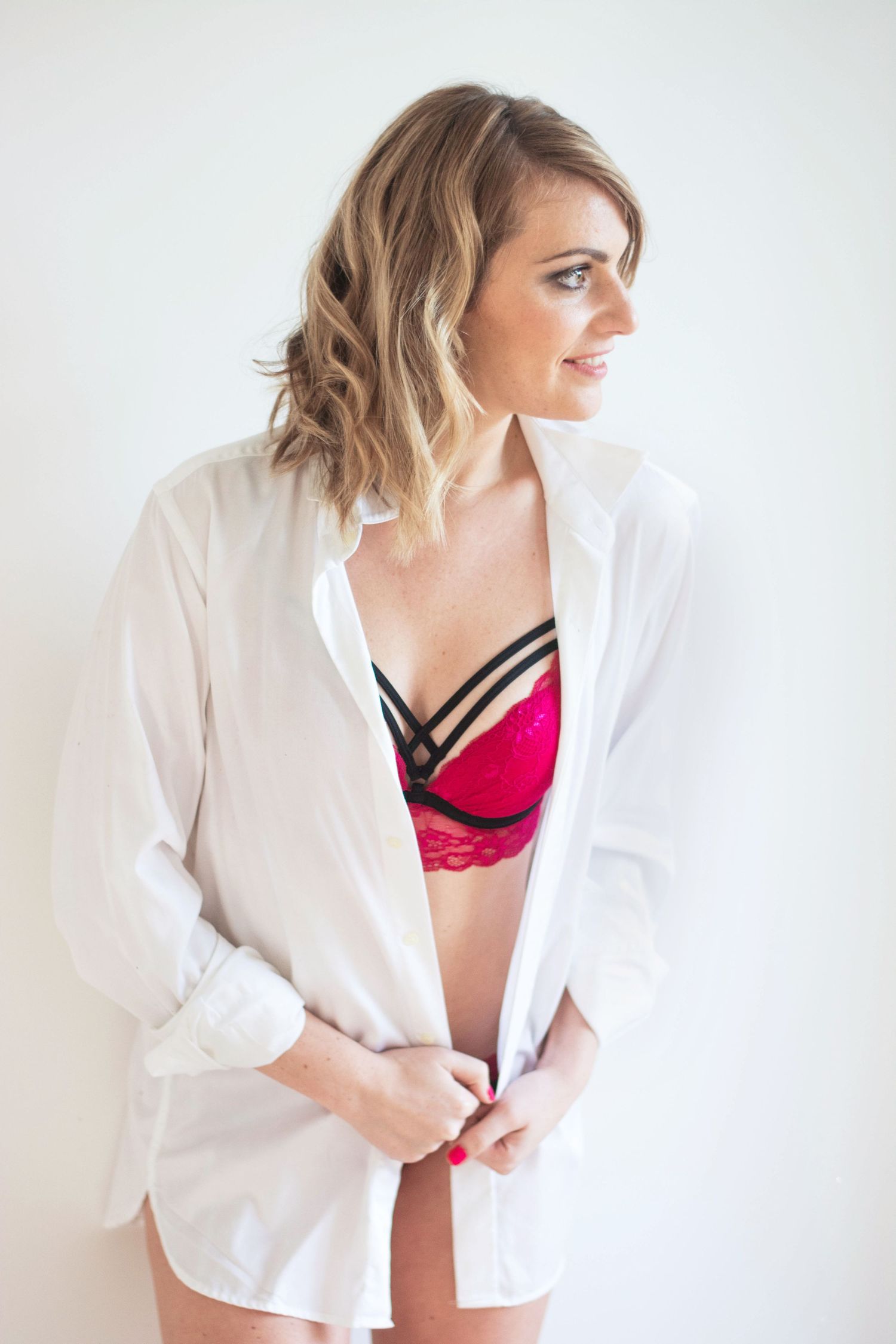Fashion series featuring white button-down shirt and pink lingerie against white backdrop.