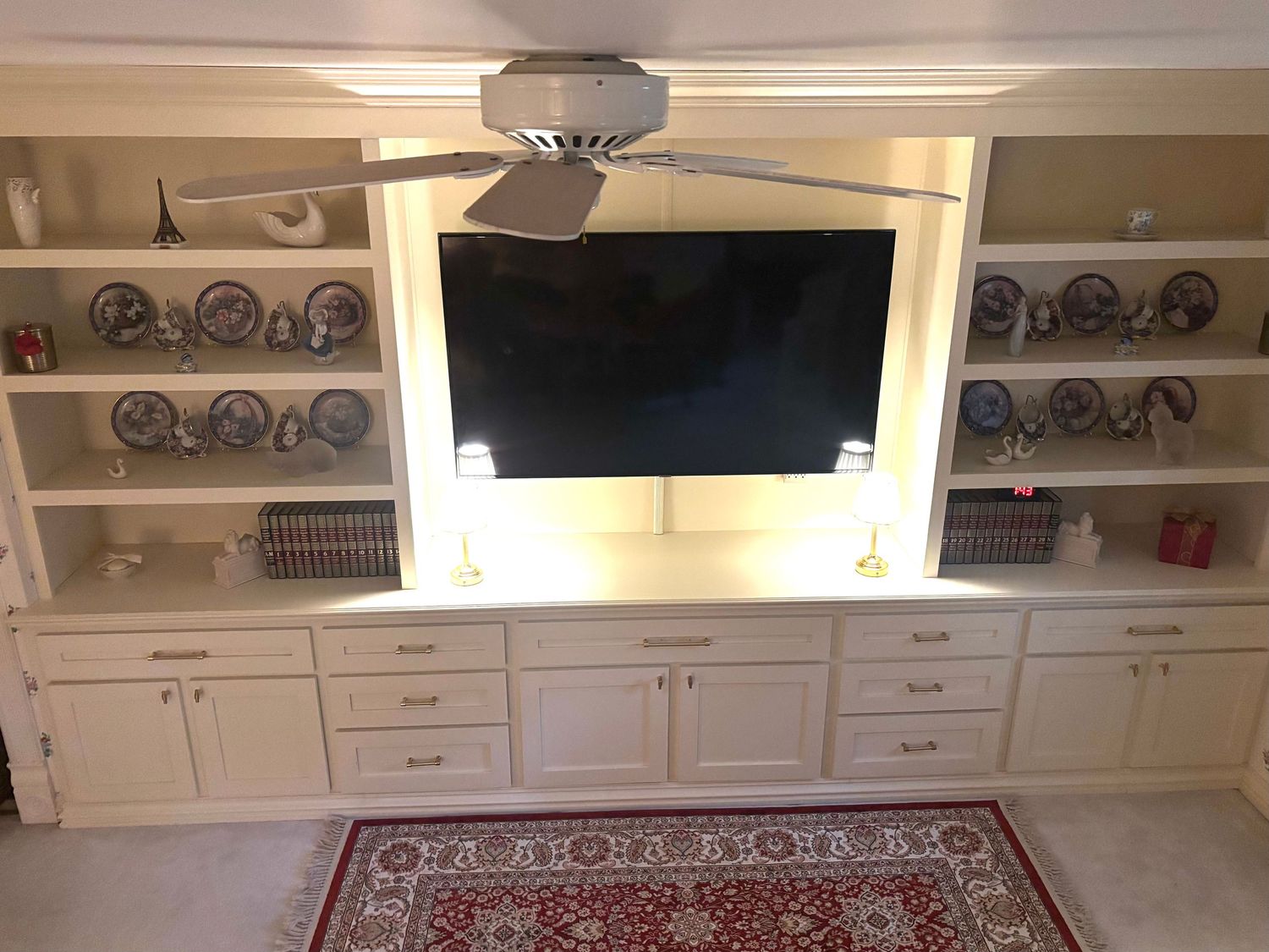 Custom designed built and finished to match existing woodwork in master bedroom.