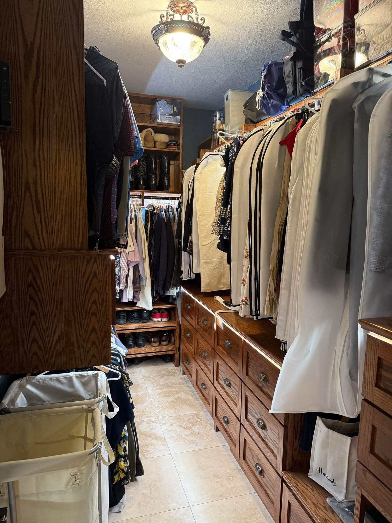 Custom designed closet in primary bedroom.