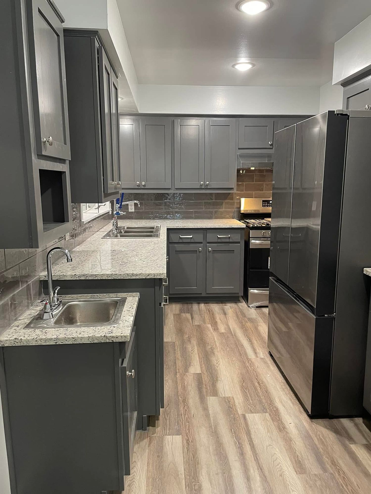 Home daycare kitchen. Designed to meet government regulations with warm appealing style.