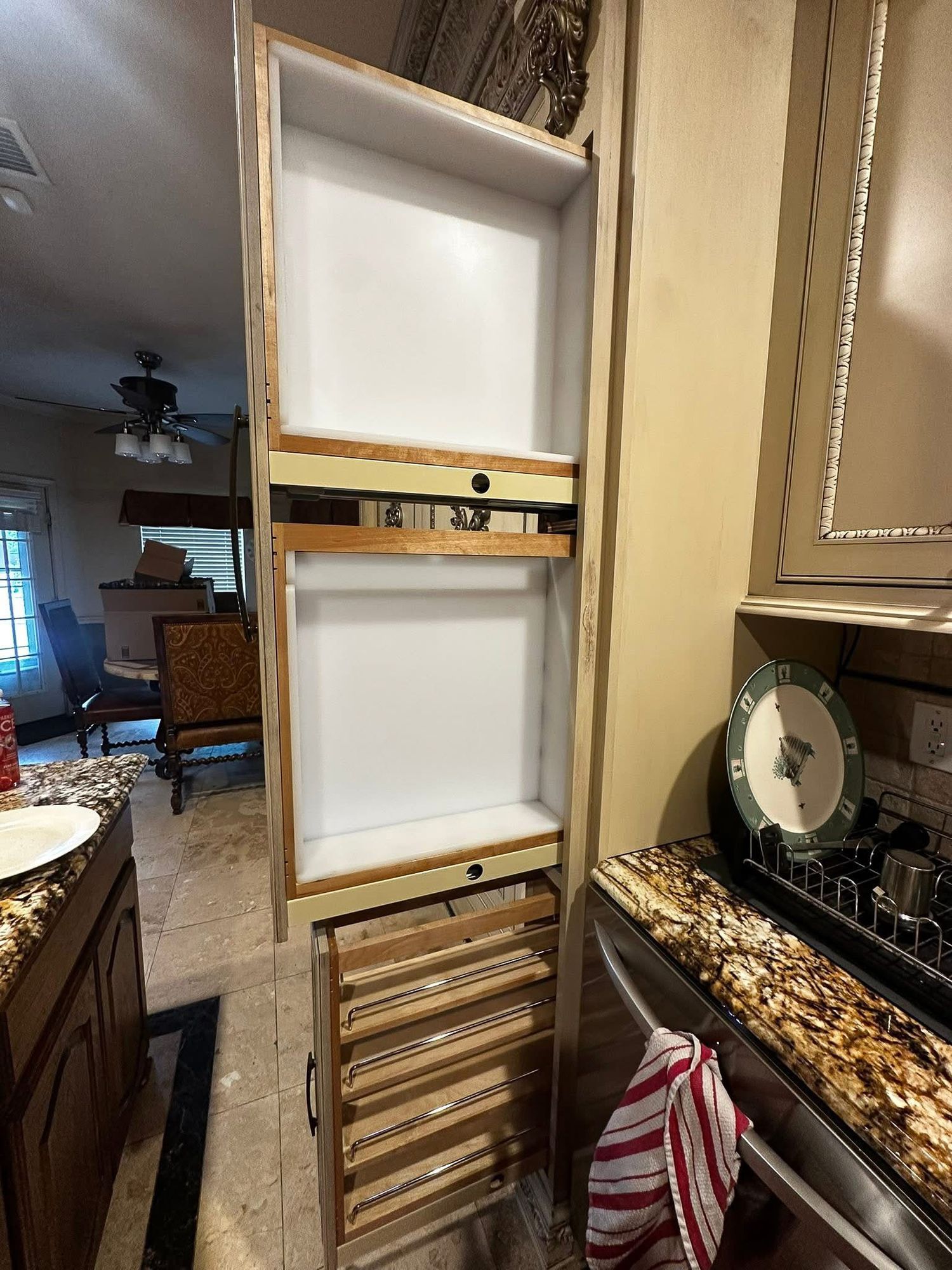 Pullout cutlery storage.