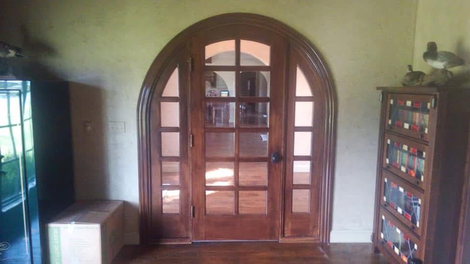 Custom built office arched door to provide privacy.