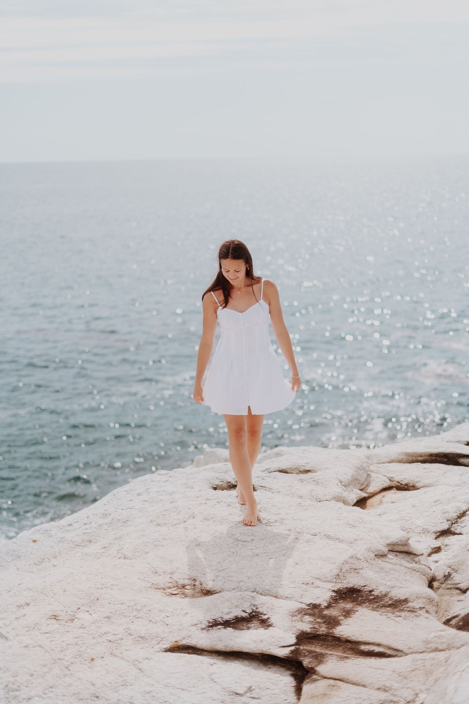 Girl posed on rocks