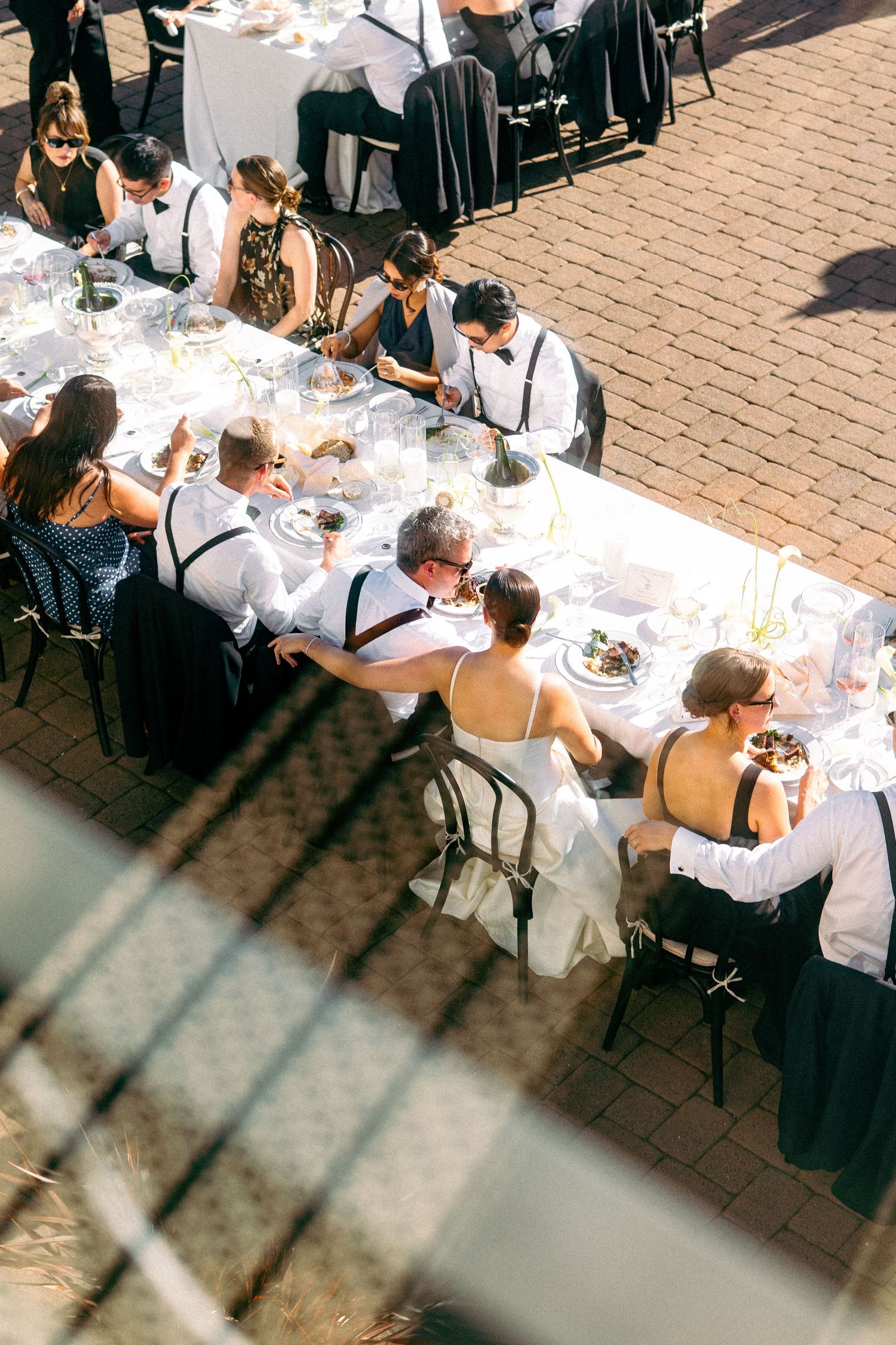 couple hugging while eating from above