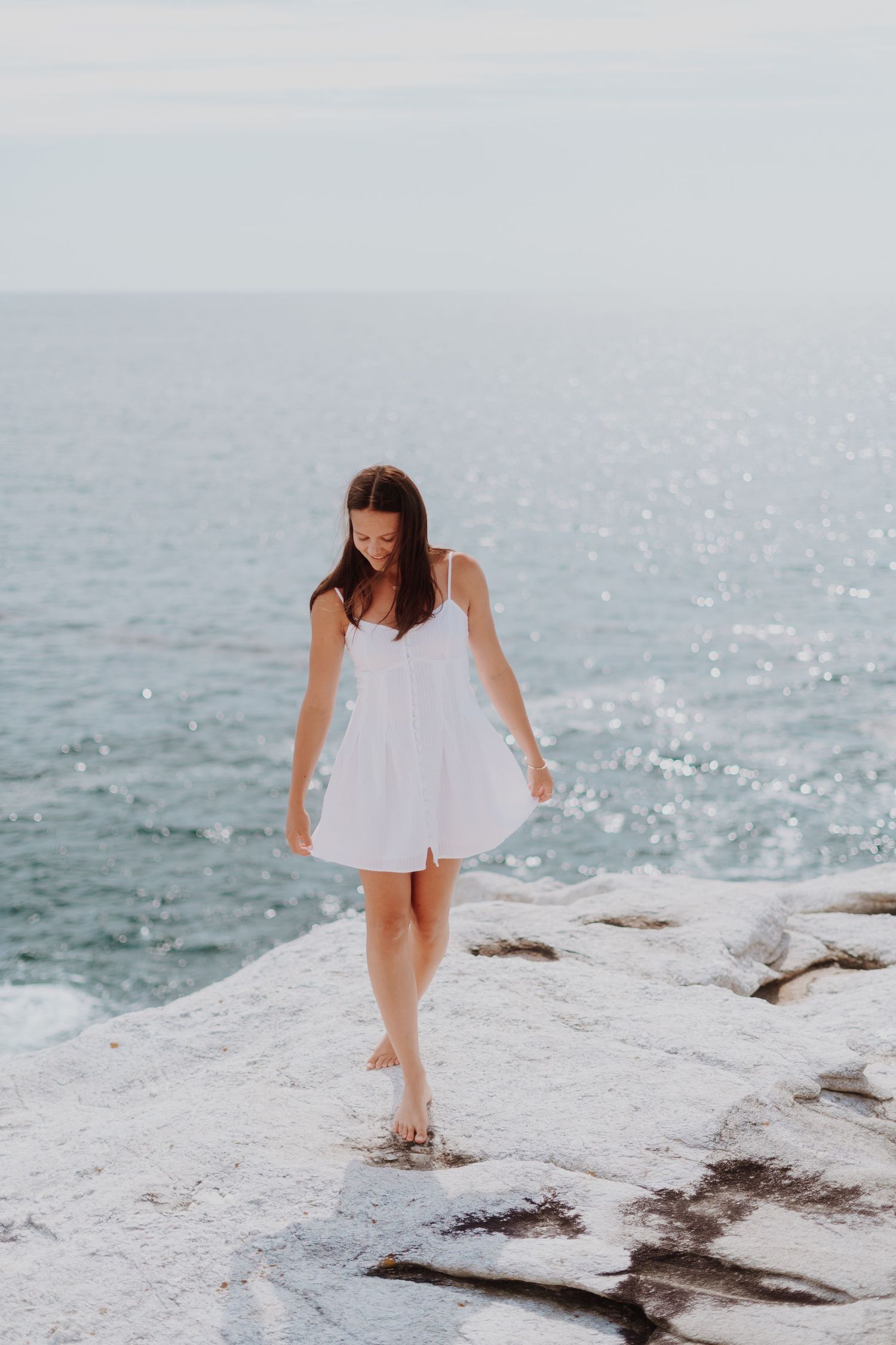 Girl posed on rocks