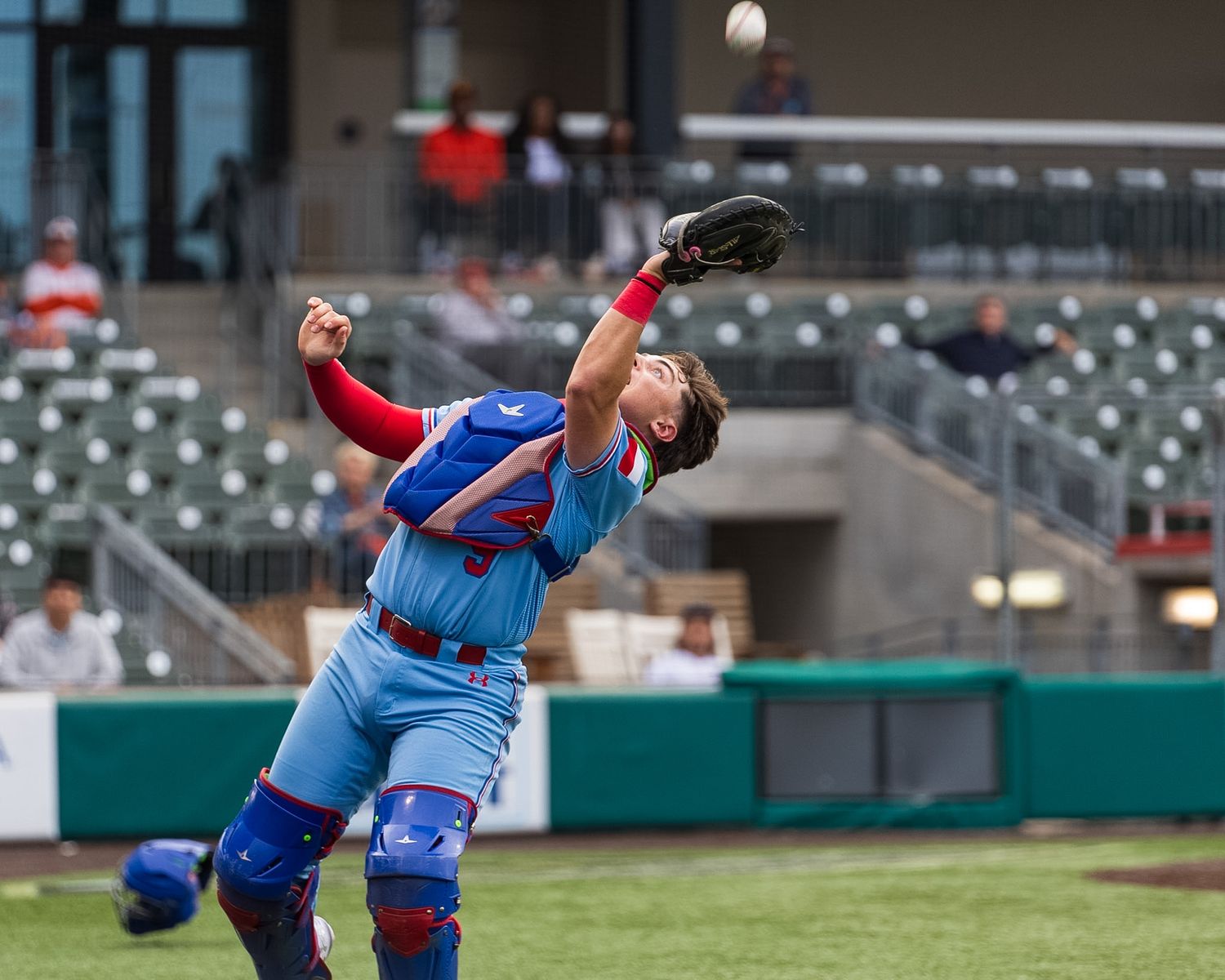 catcher catching a pop fly