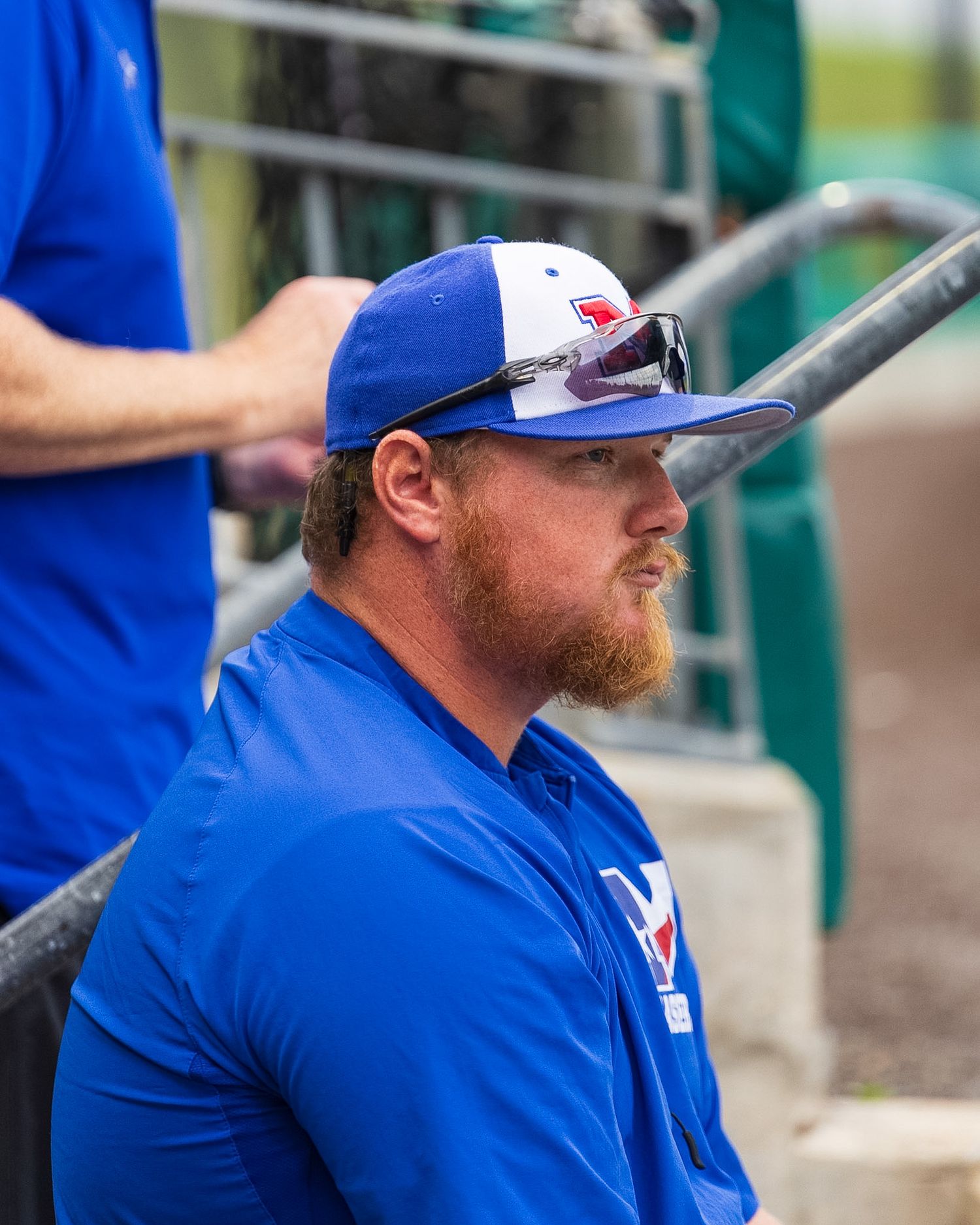 baseball coach watching the field
