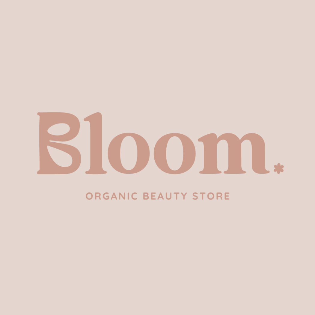 Elegant typography logo for Bloom organic beauty store in dusty rose color.