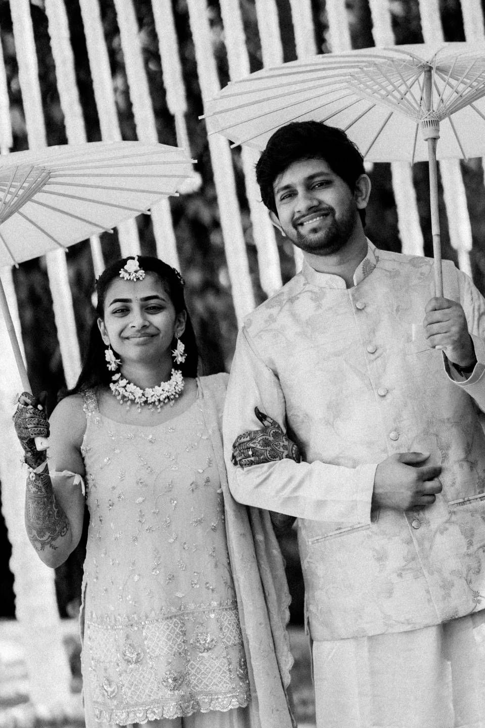Memory Lane Studios elegant Indian wedding photography in Boston featuring black and white couple portraits with parasols by Tharun Palla