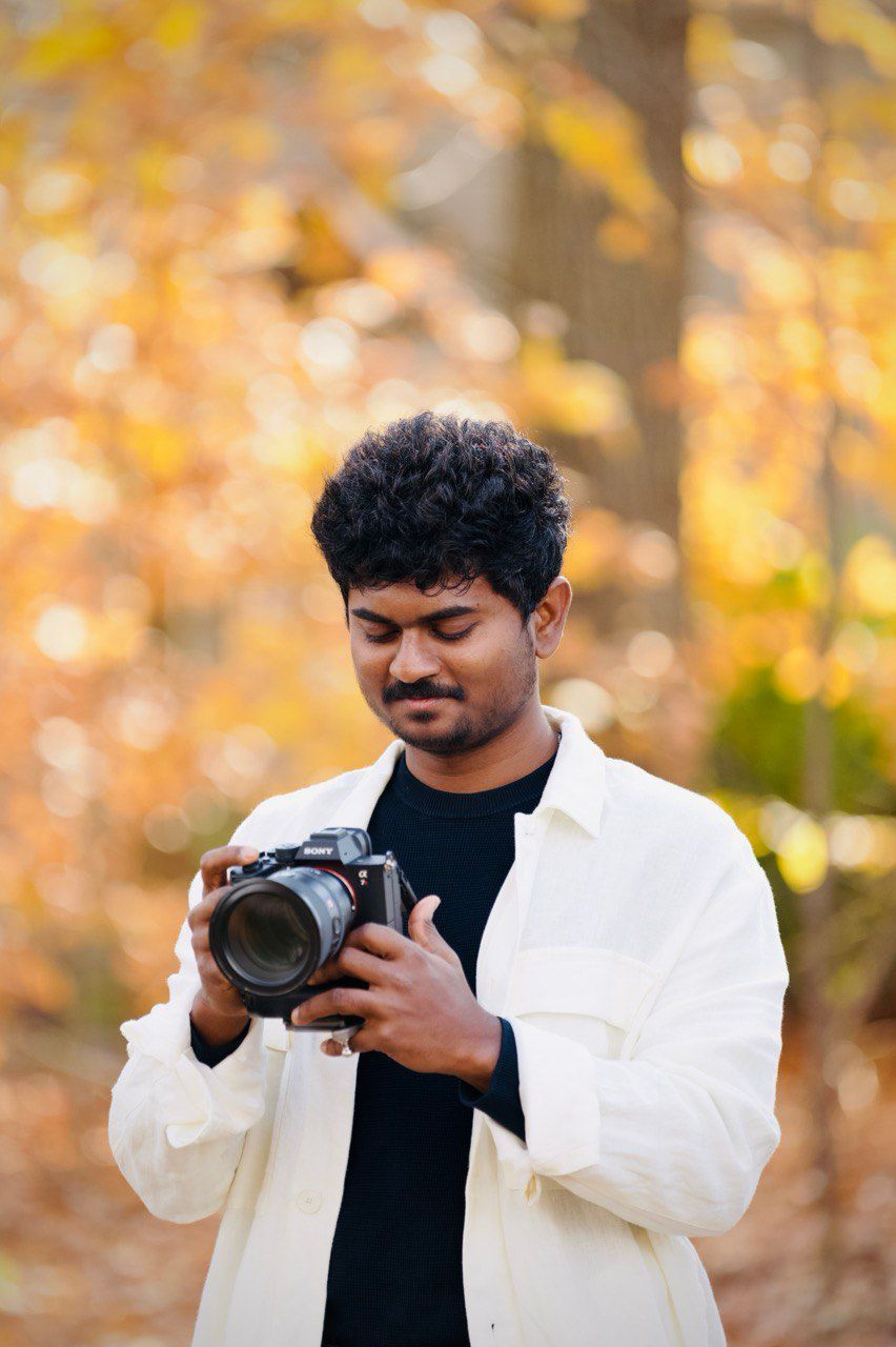 Tharun Palla Memory Lane Studios wedding photographer with professional camera ready to capture your special day