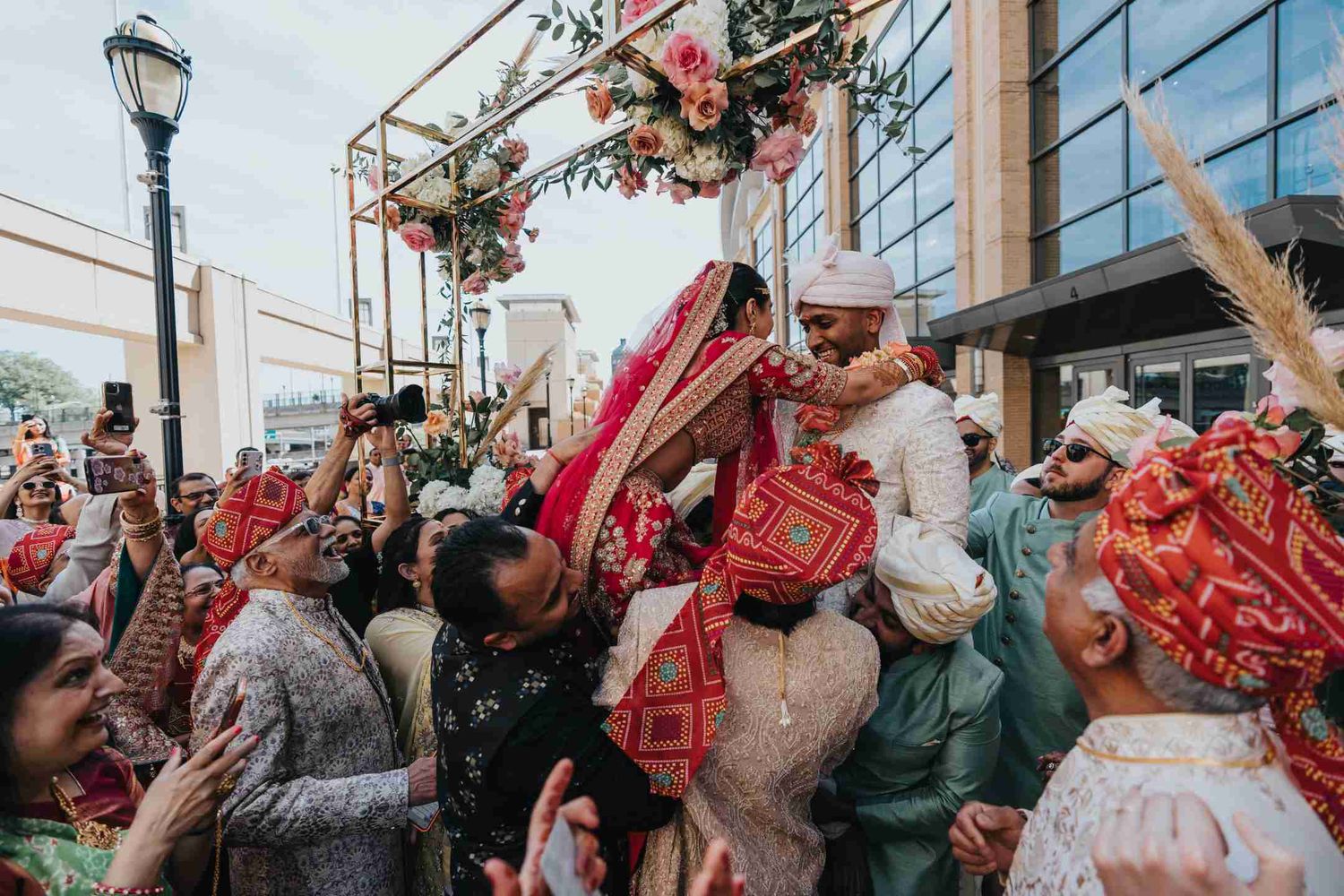 Memory Lane Studios South Asian wedding photography at Hartford Marriott featuring traditional baraat dancers in festive celebration