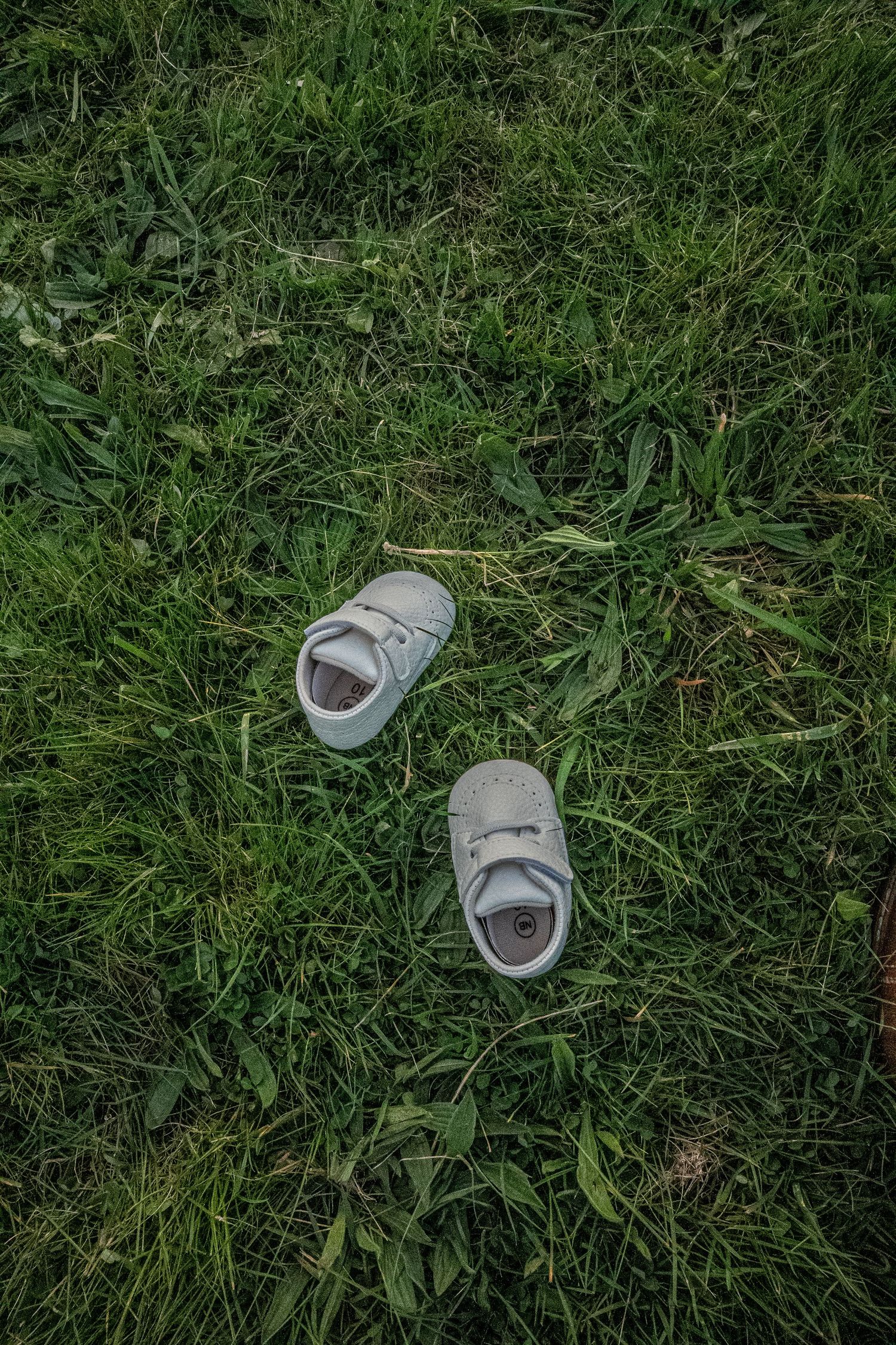 Baby shoes representing an expectant couple's unborn baby