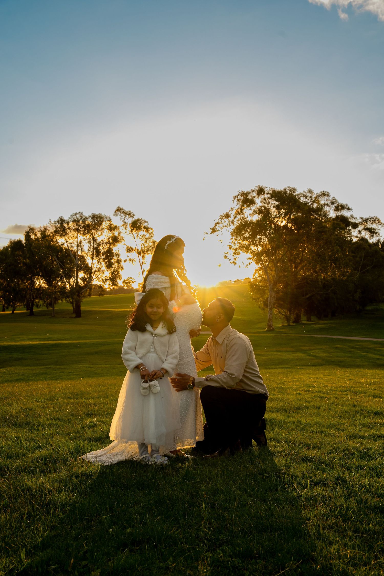 Candid family moment during a maternity photography session