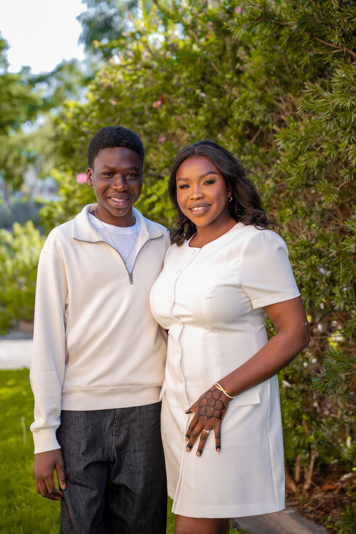 Portrait of two family members during a child's baptism